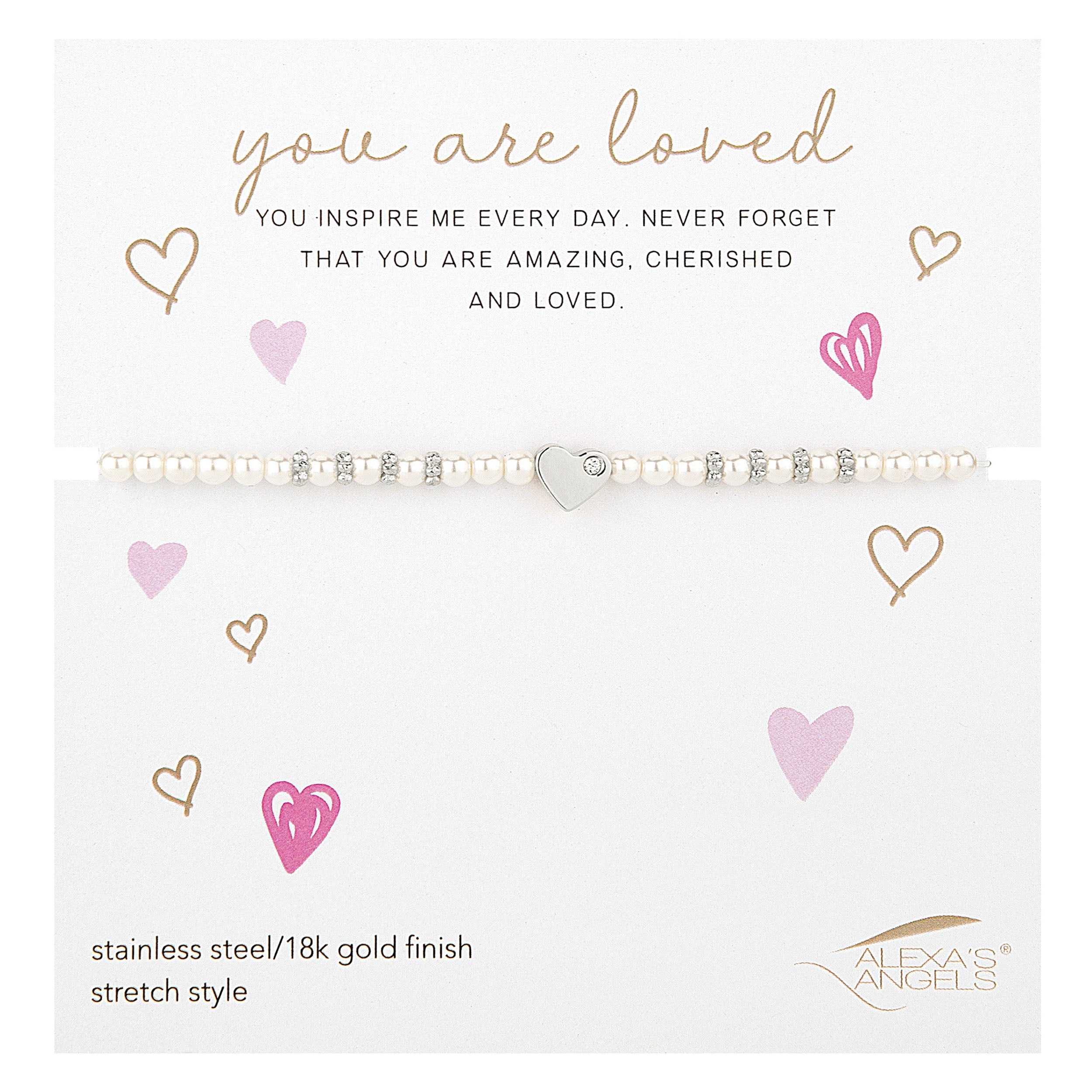 Bracelet with heart charm on a card with motivational message and brand name
