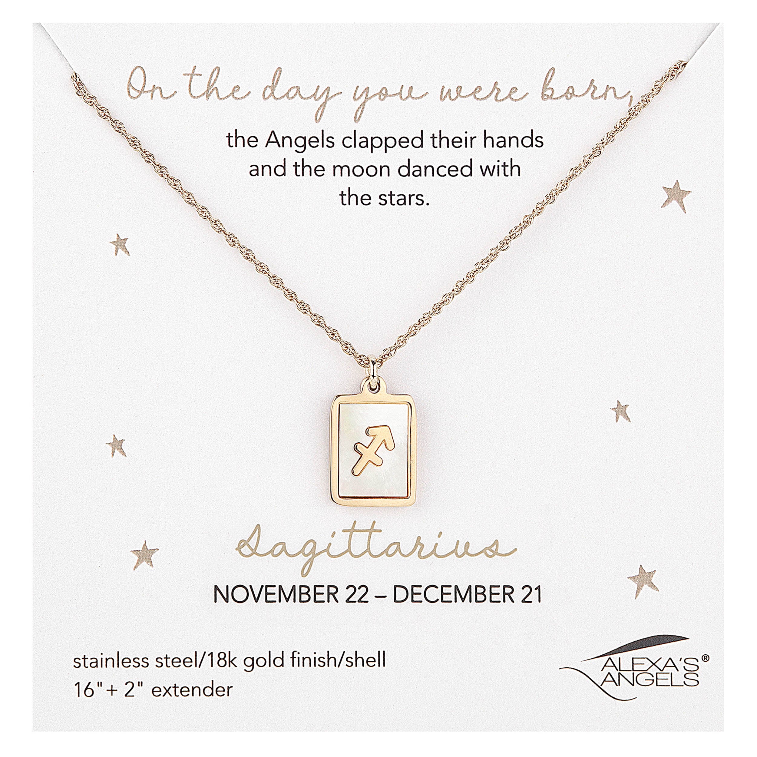 Gold Sagittarius necklace on a branded card with star design
