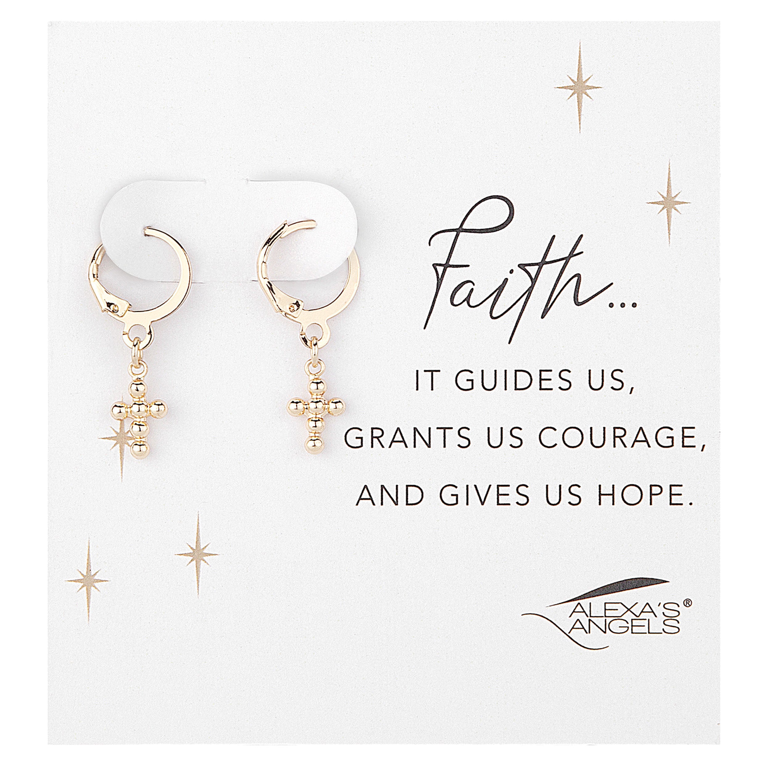 Gold hoop earrings with cross charms on a white card with text and brand name.
