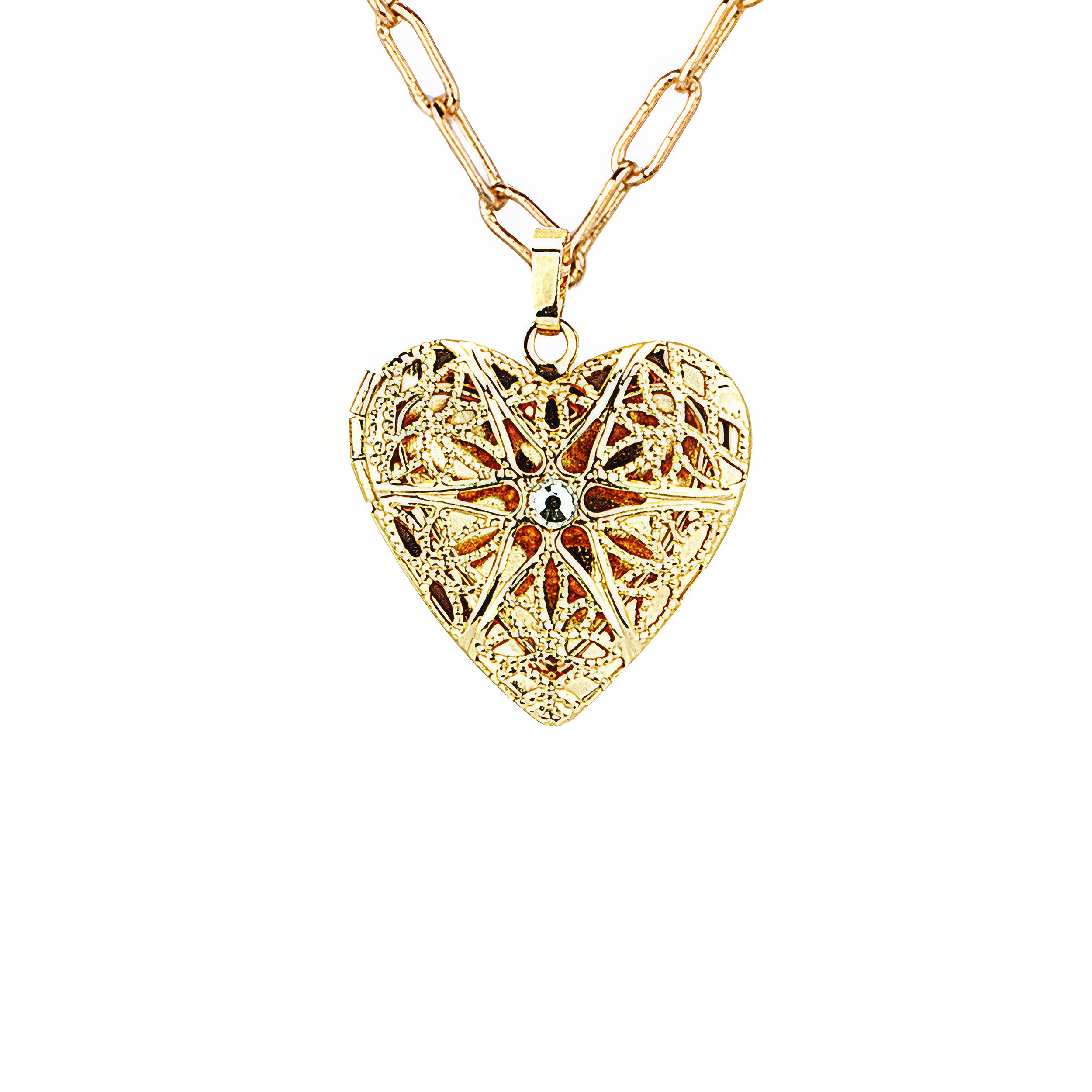 Gold heart-shaped pendant necklace on a white background
