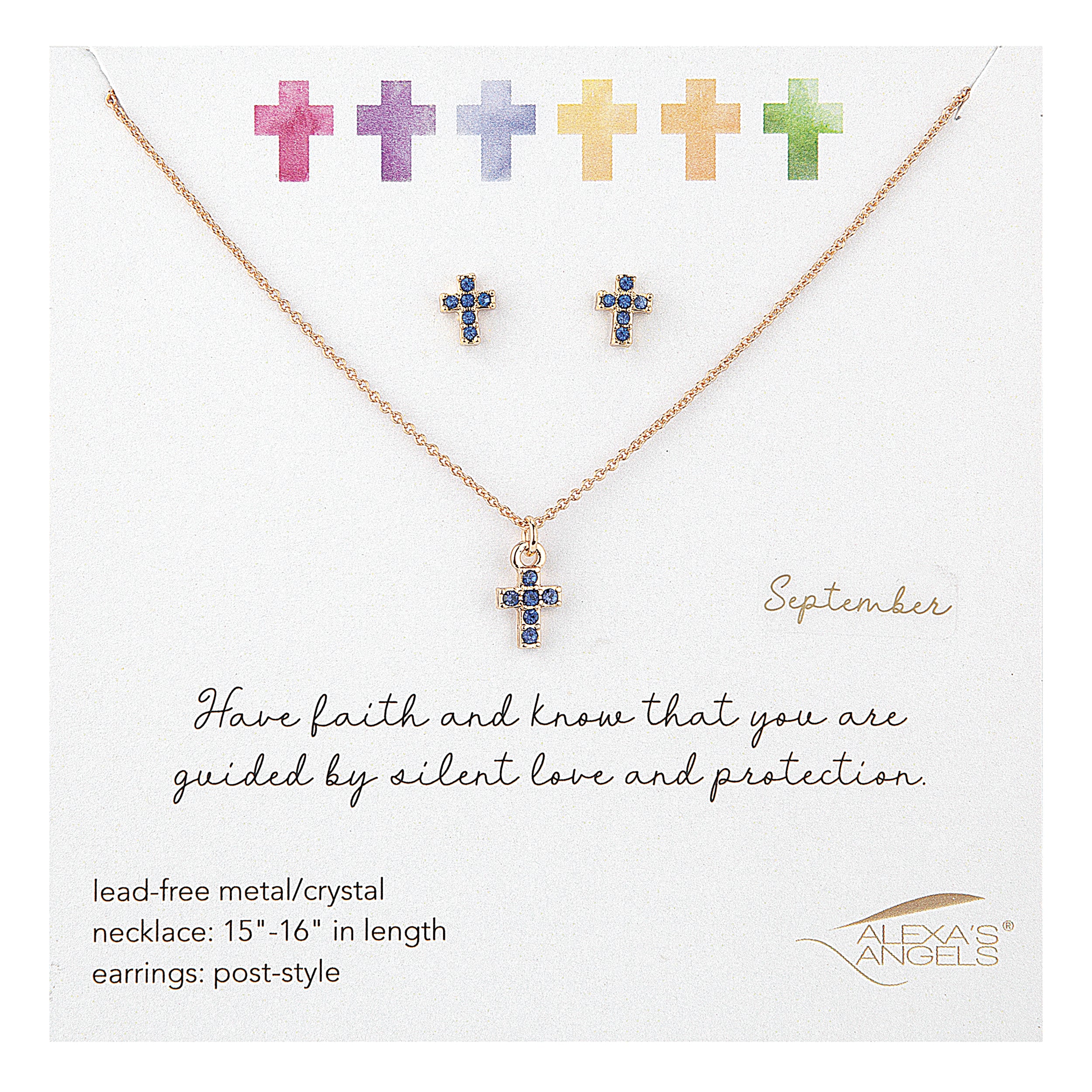 Jewelry set with cross necklace and earrings on a branded card.
