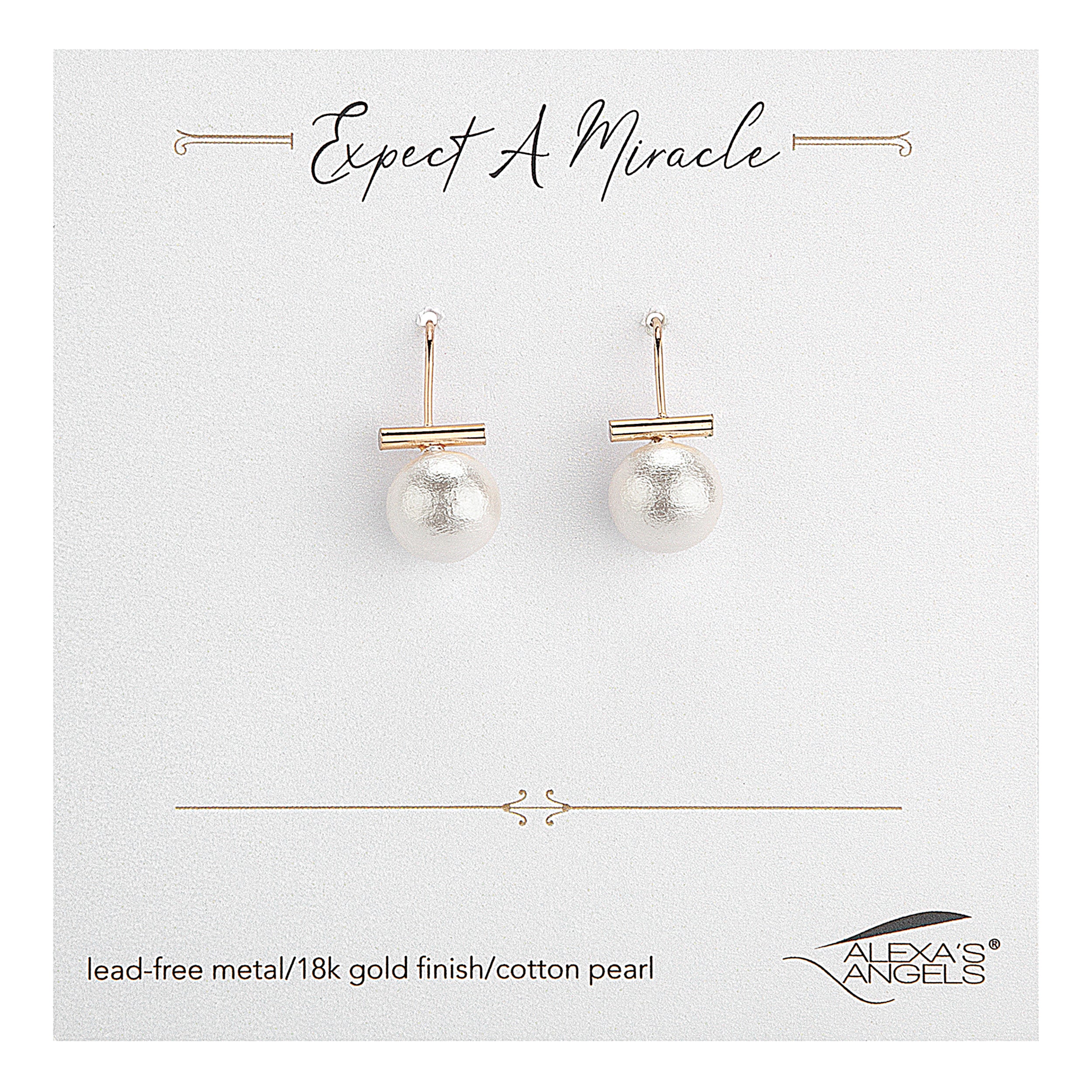 Pearl earrings on a branded card with 'Expect A Miracle' text