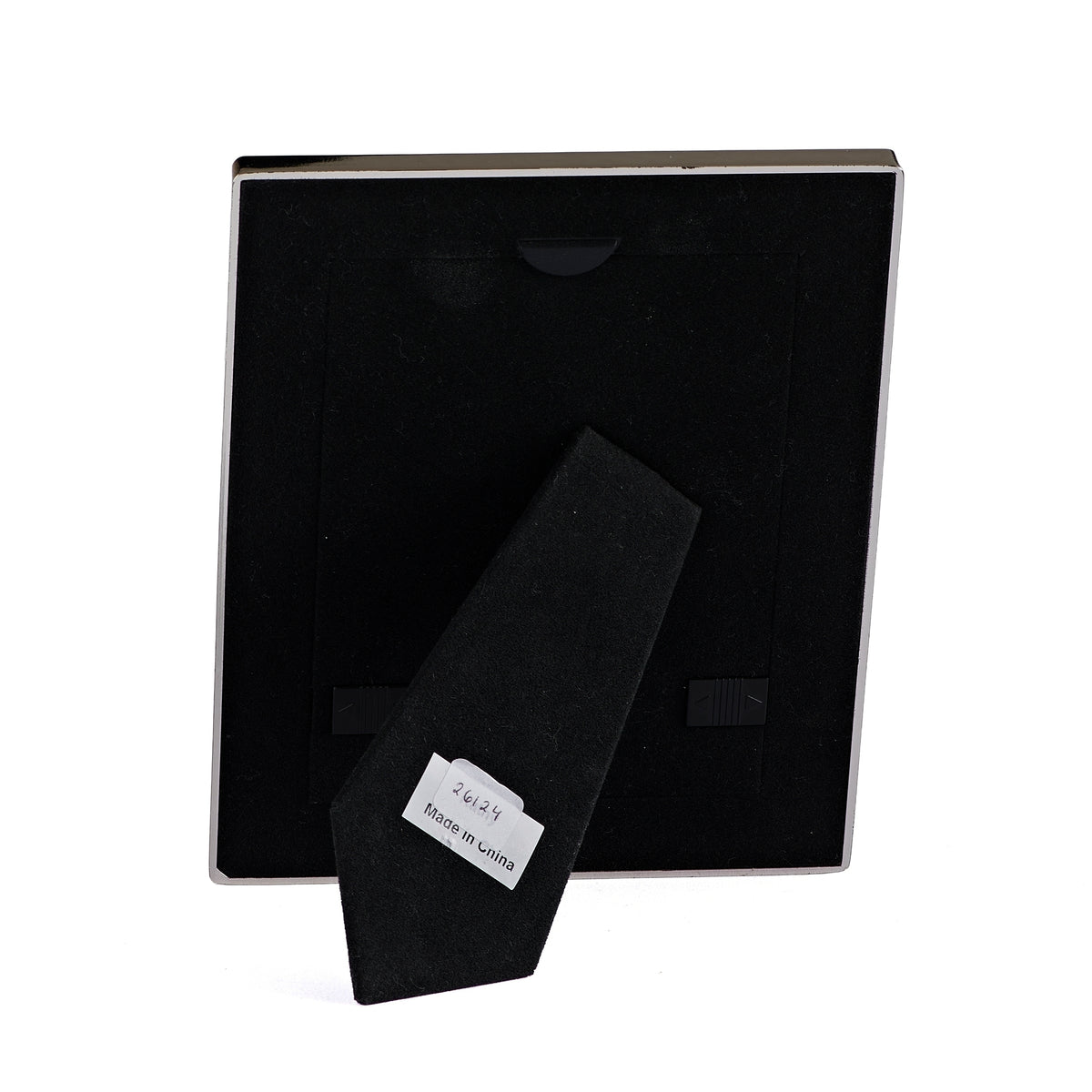 Back view of Caroline Collection First Communion Radiant Silver Picture Frame showing the black backing and fold-out easel stand