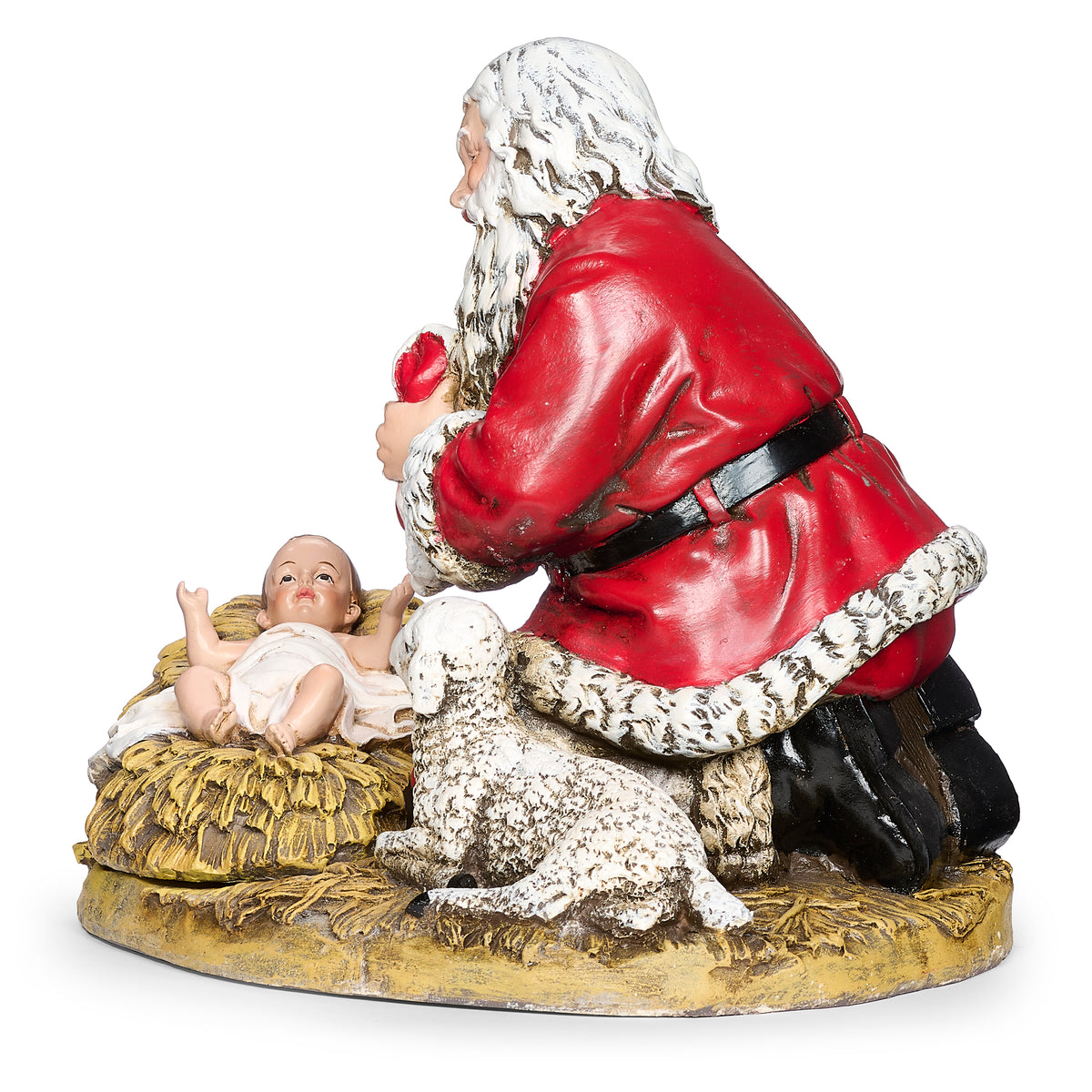 Front angled view of Joseph's Studio Kneeling Santa Figure showing Santa praying beside baby Jesus in the manger with the lamb resting at his side