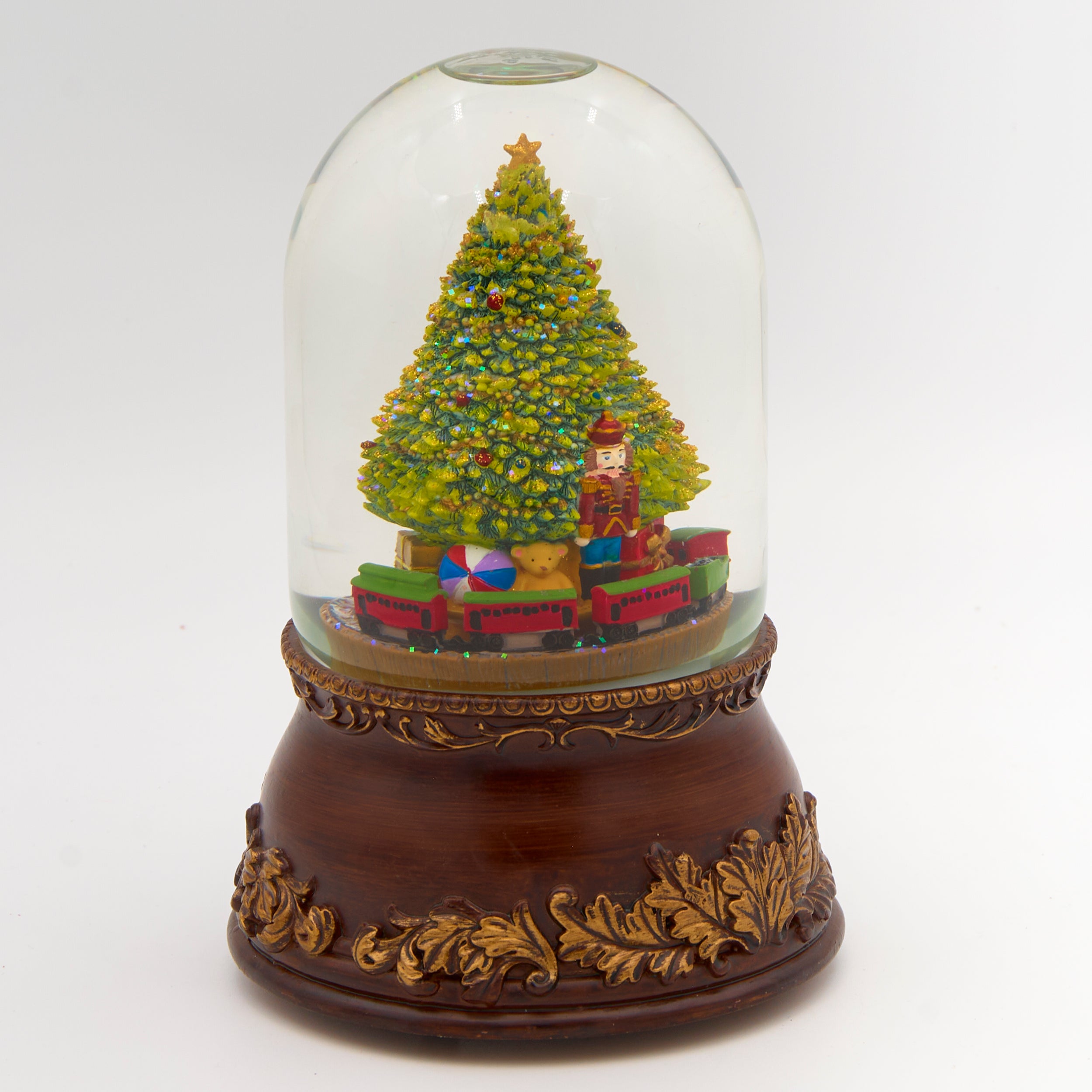 Glitterdome Musical Nutcracker Tree with Rotating Train – "Jingle Bells" Tune