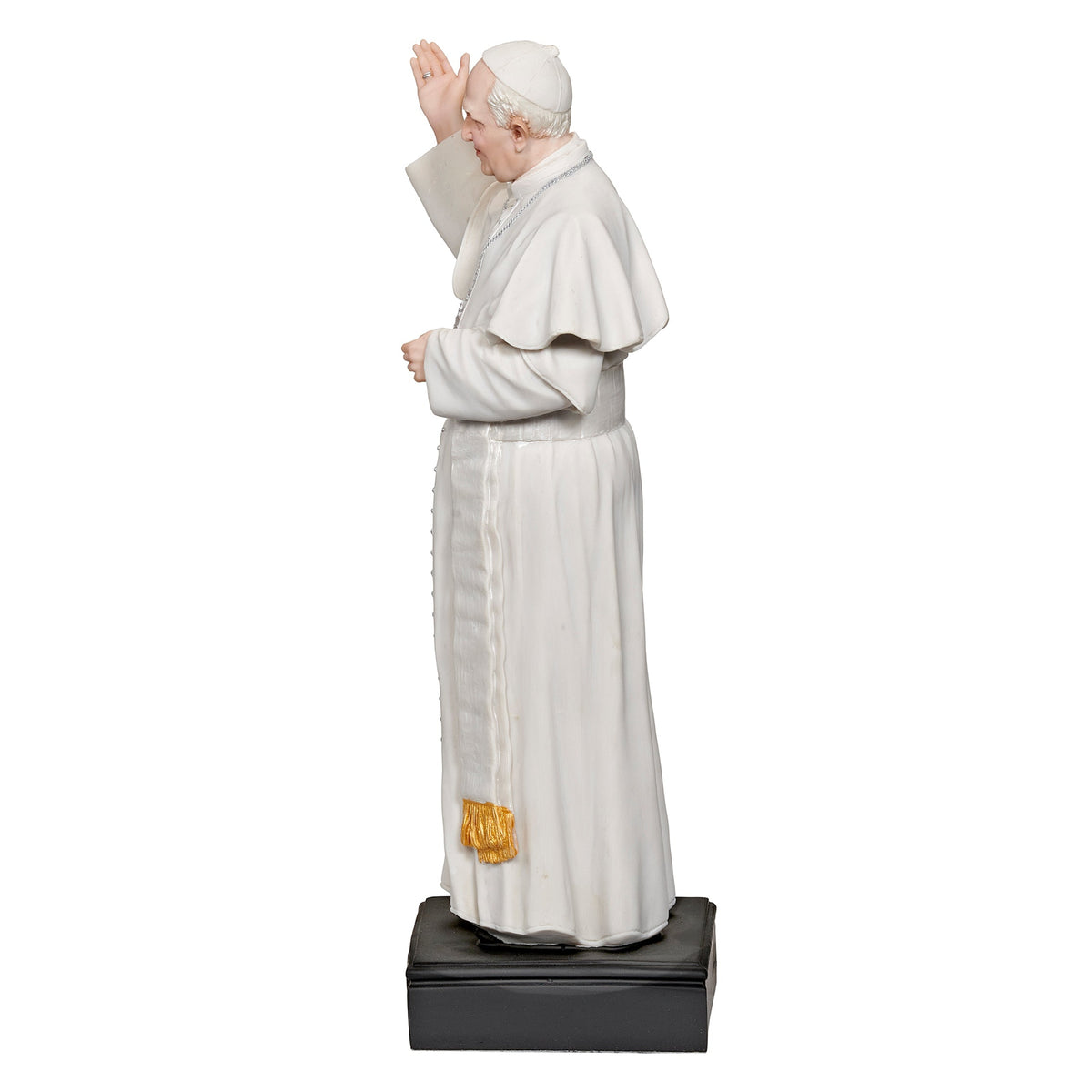 Side view of Pope Francis figure showing the profile, raised hand, and flowing white robes