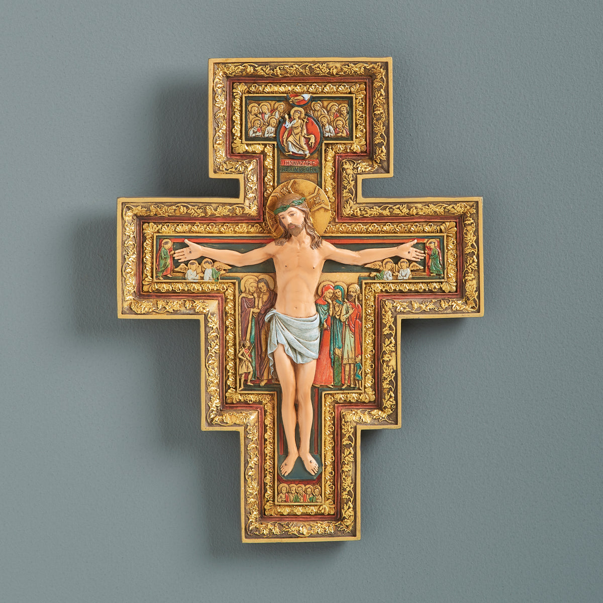 Joseph's Studio San Damiano Crucifix featuring Christ on the richly detailed icon-style cross with traditional red, gold, and earth-tone imagery