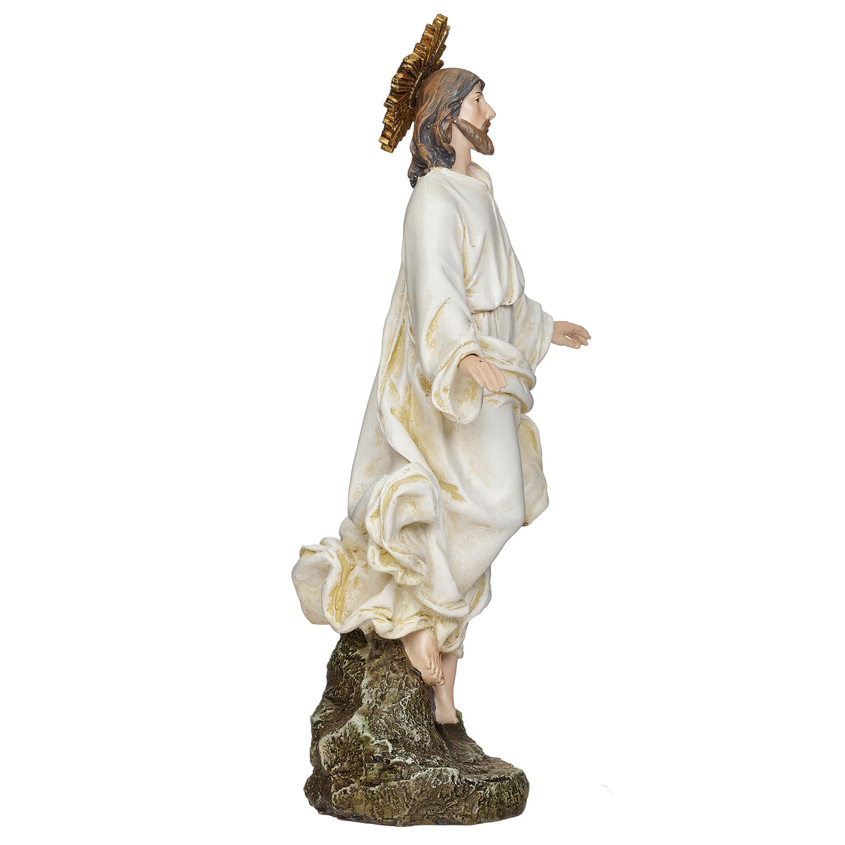 Opposite side view of Joseph's Studio Christ Is Risen Figure showing the raised robe folds, open arm, halo, and sculpted base