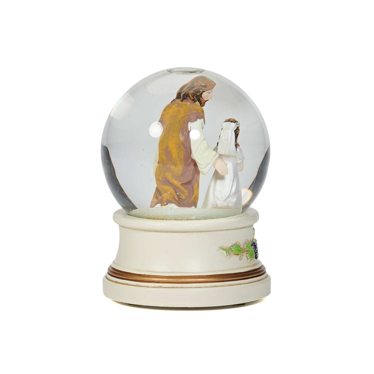 Side view of First Communion musical glitterdome showing Jesus in white and gold robes beside the girl in her Communion dress
