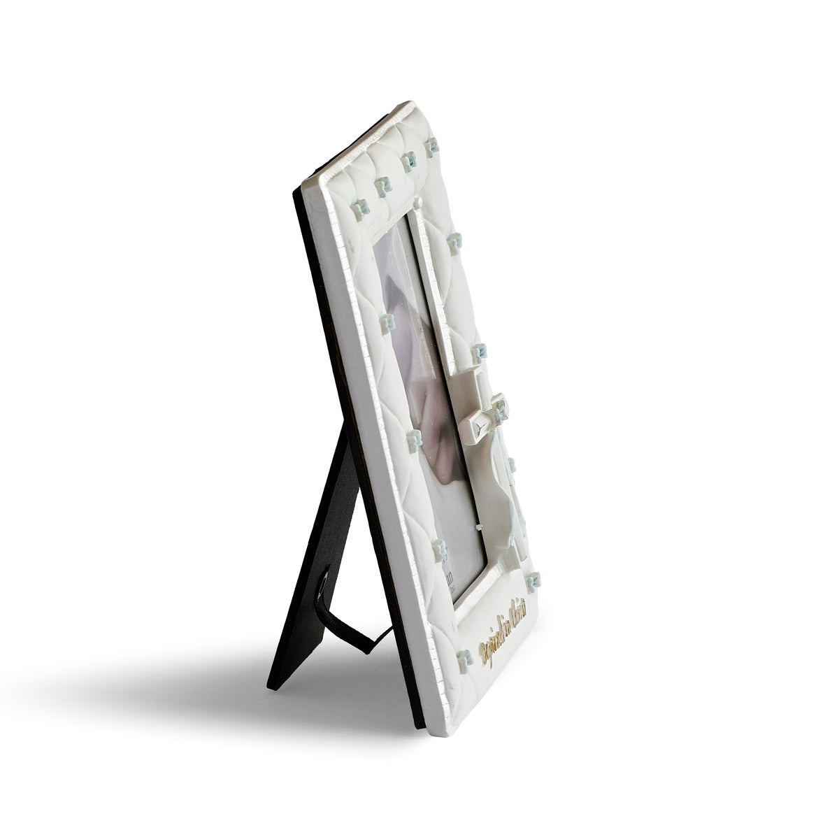 Side view of blue Baptized in Christ Quilted Picture Frame showing the slim frame profile and open tabletop easel stand