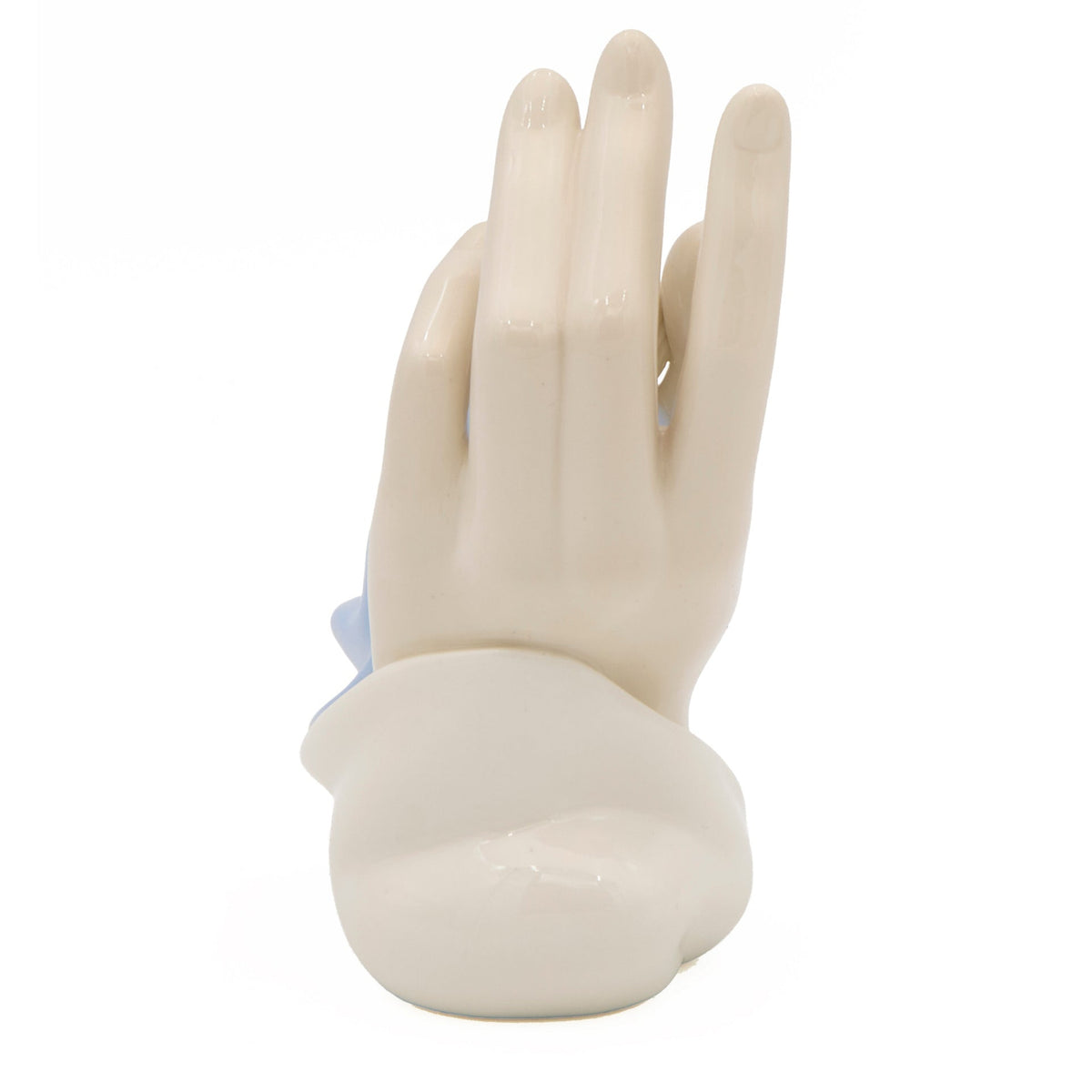 Back view of blue Safe in His Hands Figure showing the sculpted ivory hand and soft blue gown