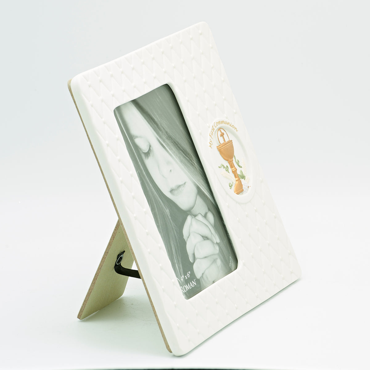 Front angled view of My First Communion Quilted Chalice Emblem Picture Frame showing the white quilted texture, chalice emblem, and photo opening