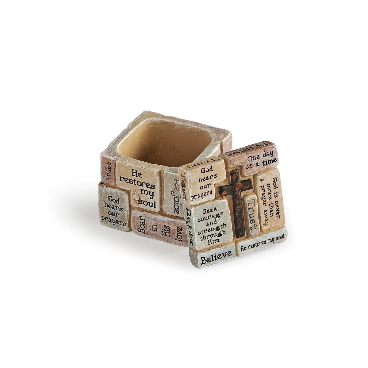 Open trinket box with its decorated cross lid leaning against the side, revealing the interior.
