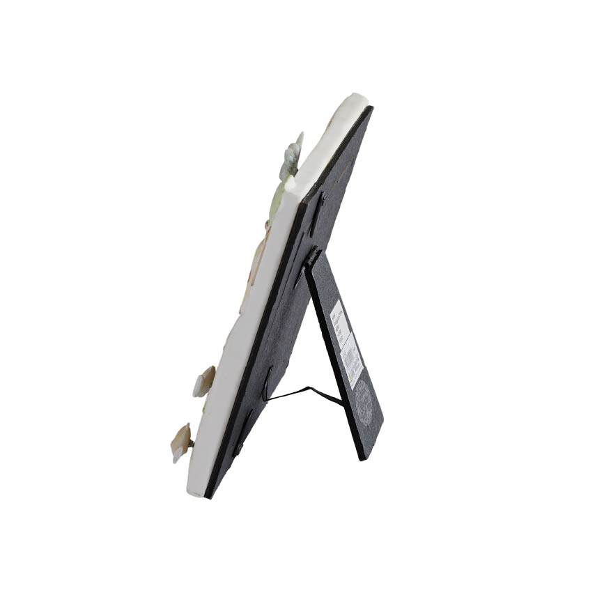 Side view of God Created Everything Picture Frame showing the decorative frame depth and tabletop easel stand