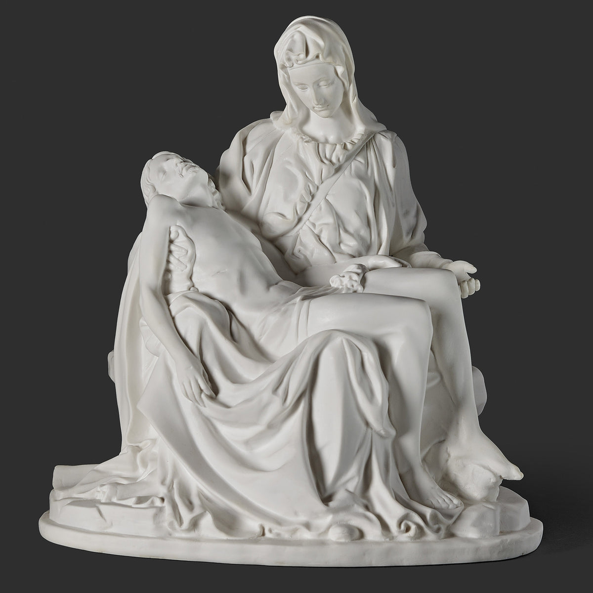 Joseph’s Studio White La Pietà Figure featuring Mary seated and holding the body of Christ across her lap in a smooth white finish