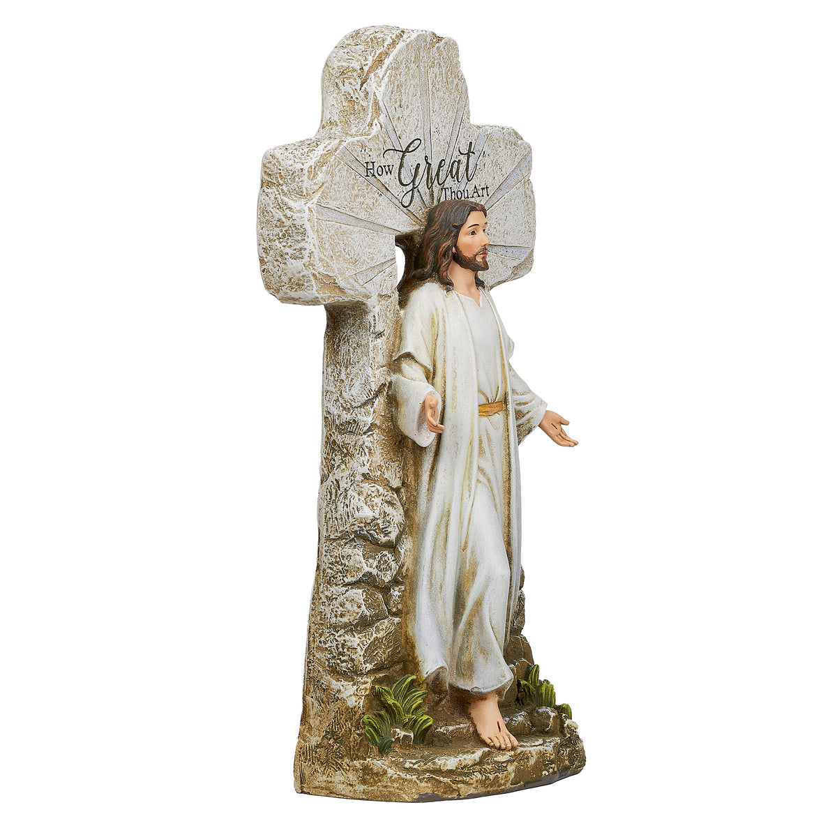 Side view of Joseph's Studio Jesus Rising Figure showing Christ with one arm extended beside the textured cross and stone tomb base