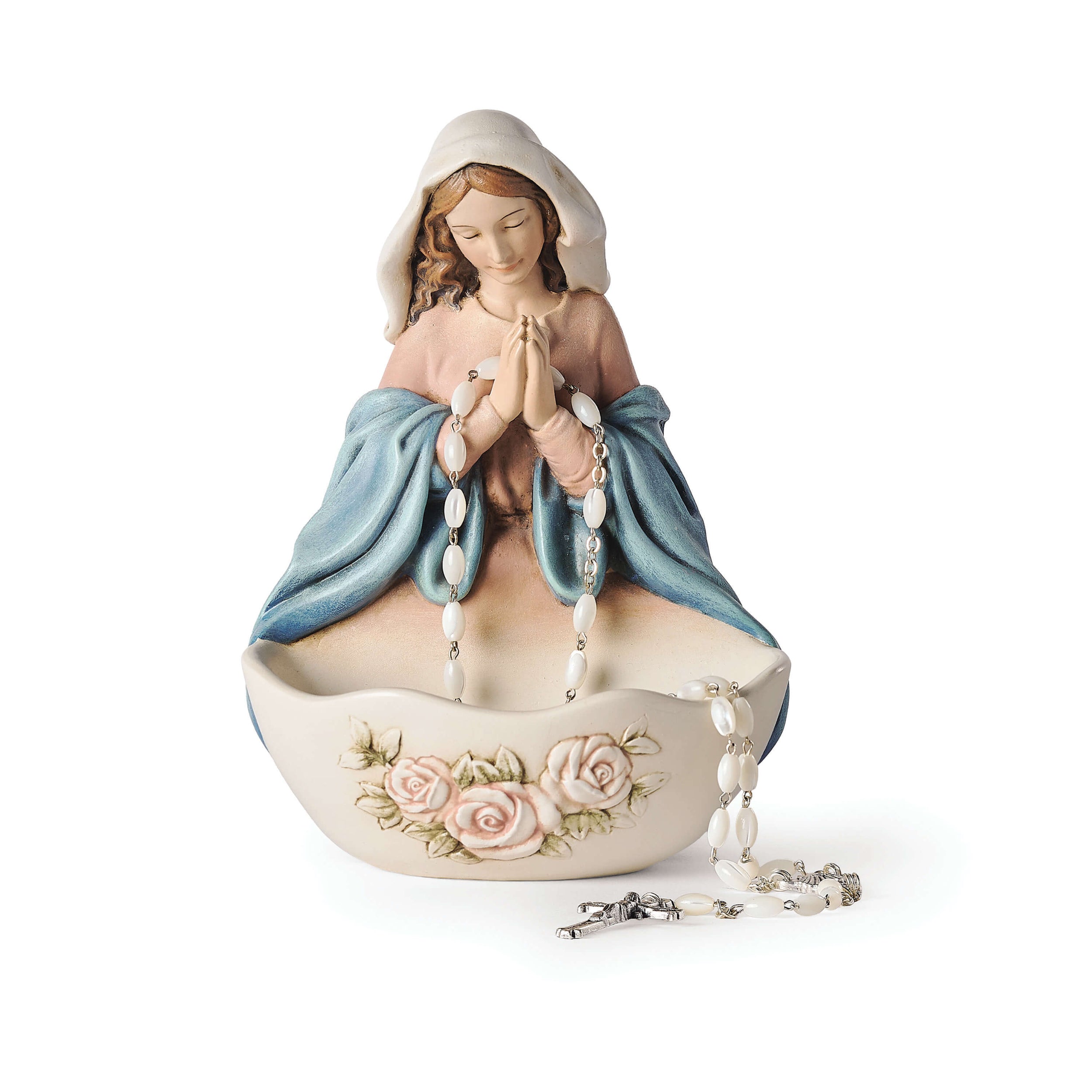 Statue of a praying figure with a floral design on a white background