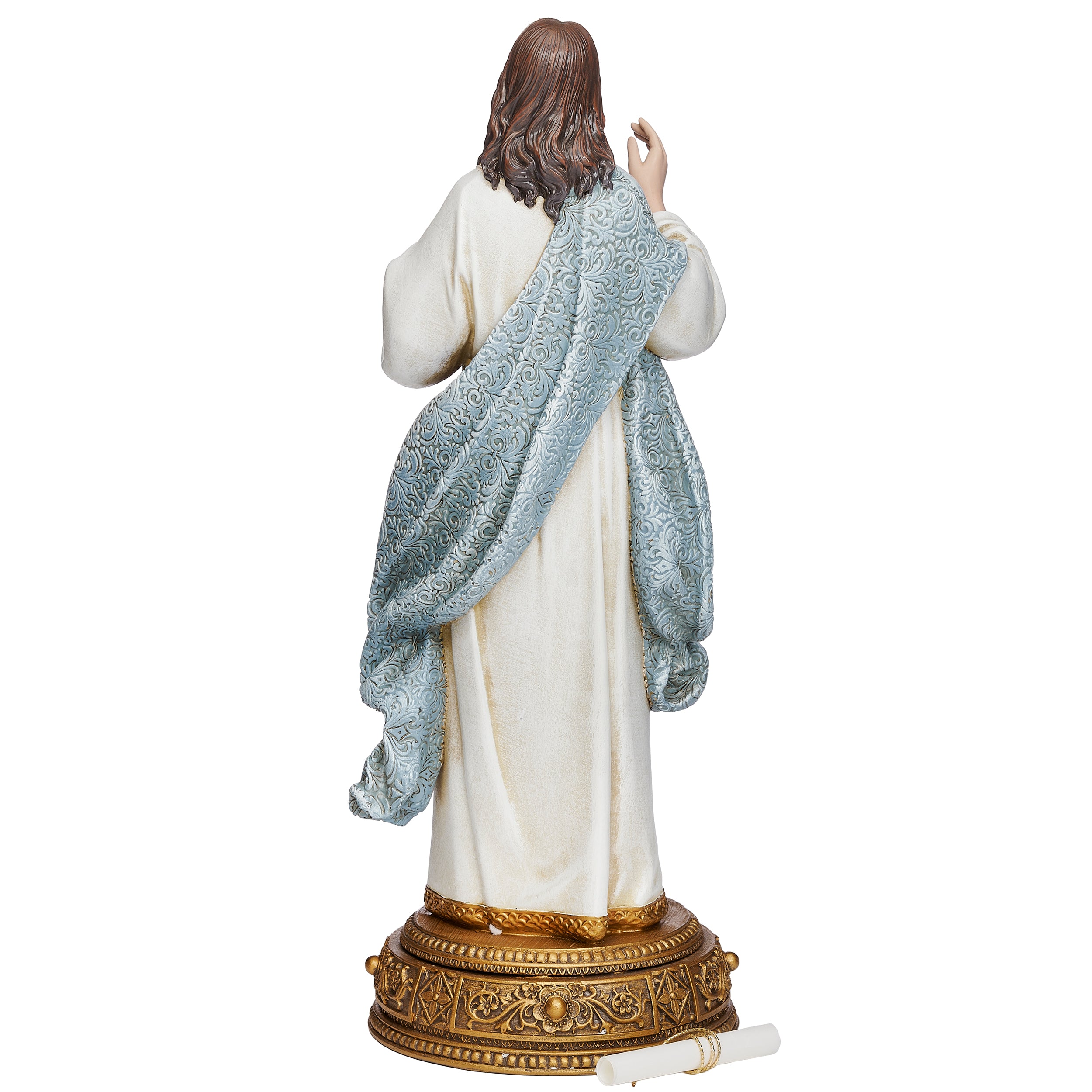Statue of a religious figure with a white robe and blue shawl on a white background