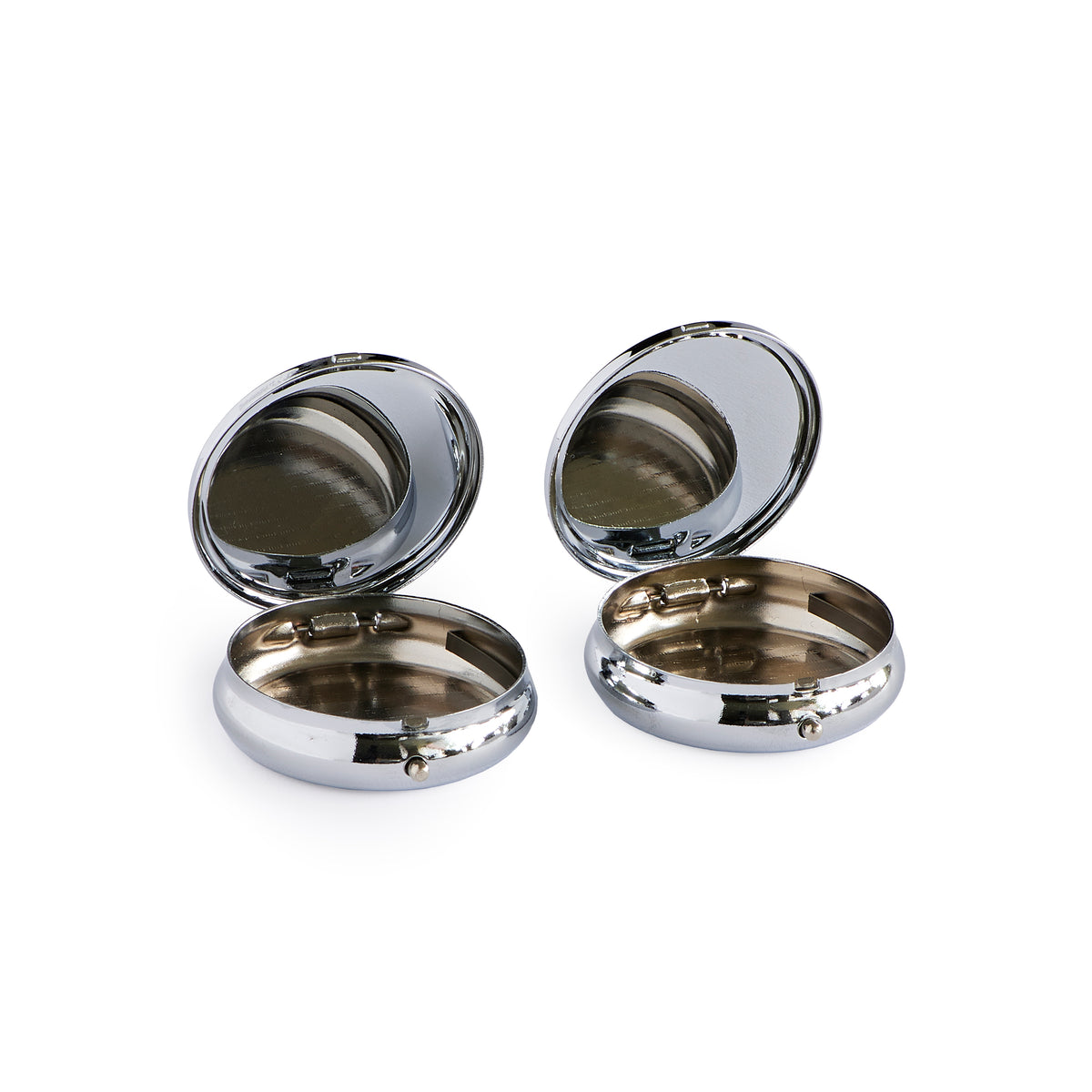 Open view of Baby’s First Tooth & Curl Keepsake Box Set showing both round silver-tone boxes with hinged lids and small interior compartments