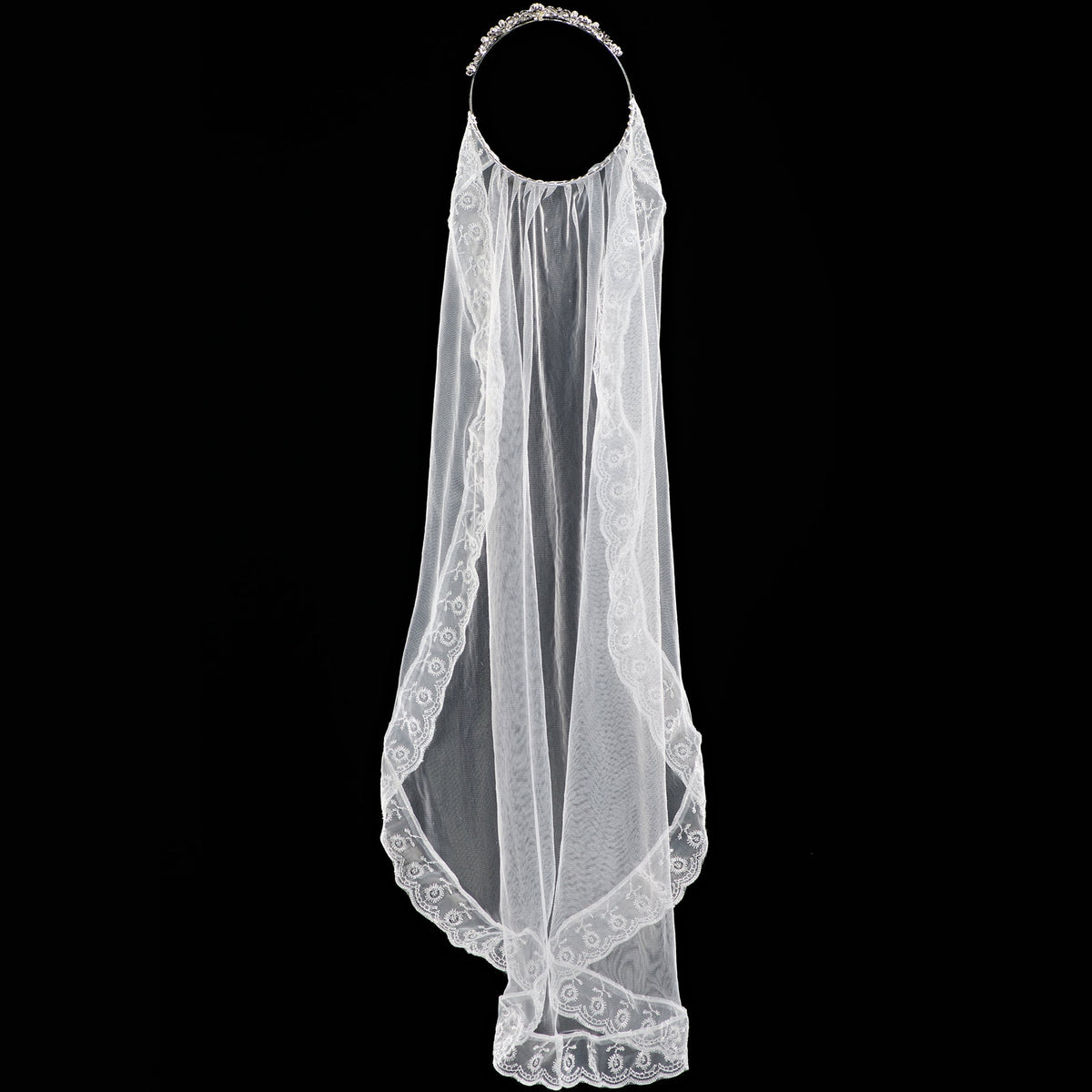Back view of Kate First Communion veil showing the long white veil with lace edging draping from the tiara