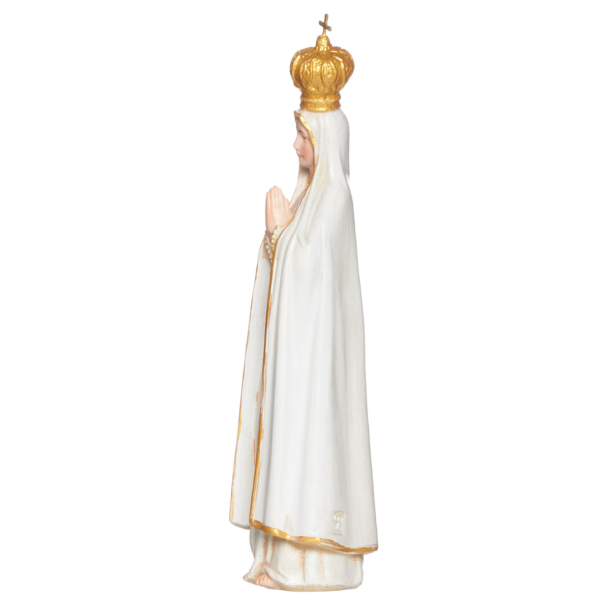 Side view of Our Lady of Fatima statue with white robes and gold accents