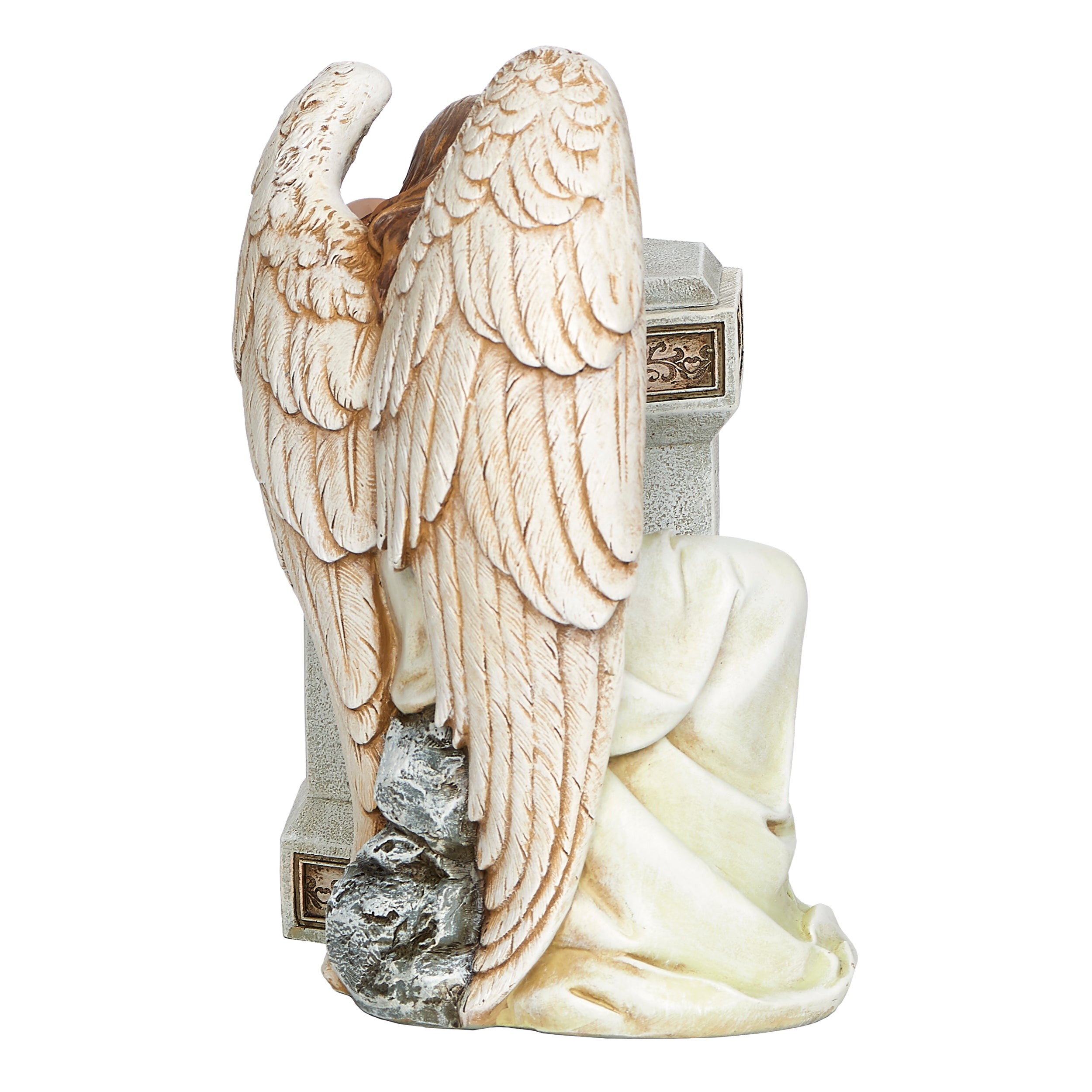 Statue of an angel with outstretched wings on a white background