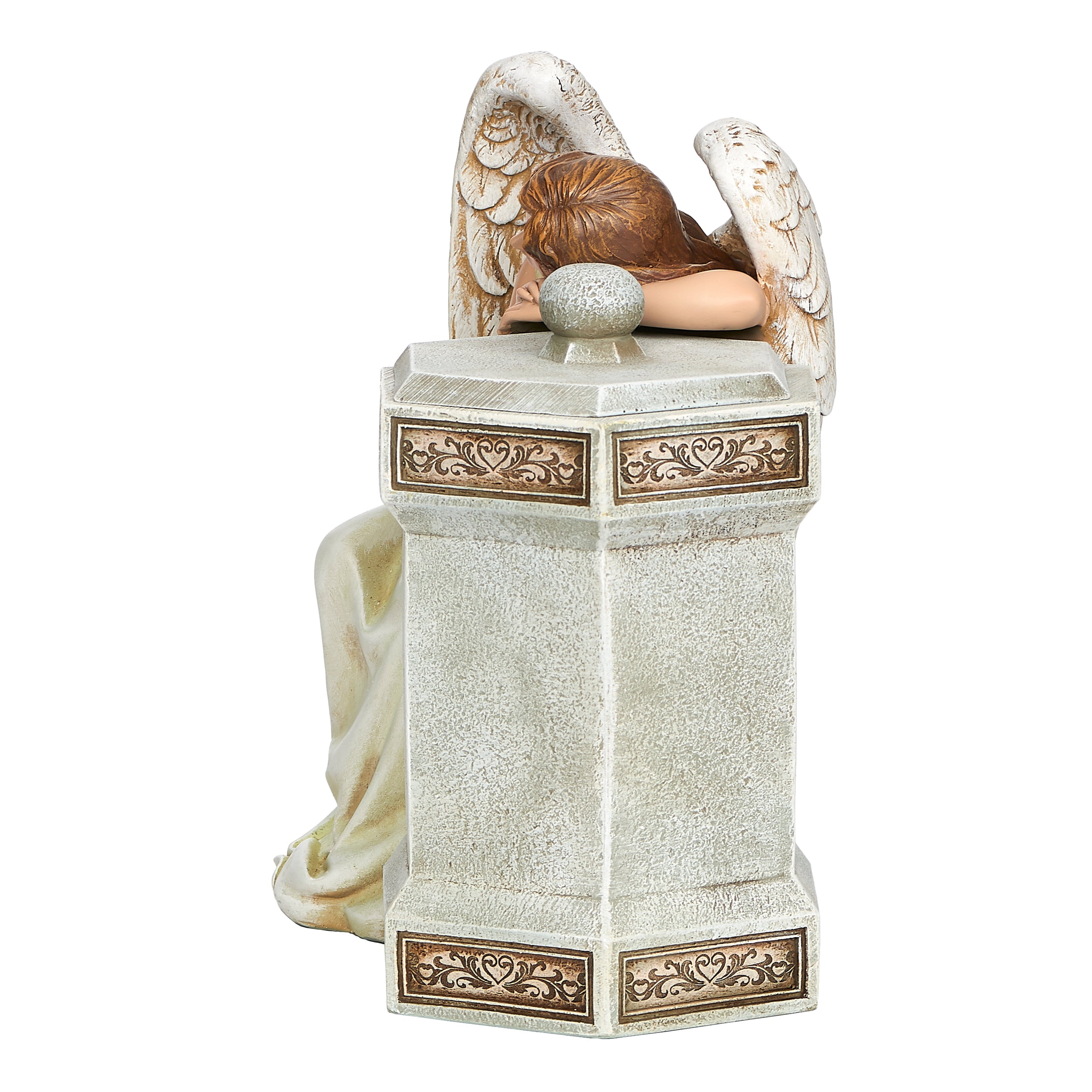 Statue of an angel with wings closed on a pedestal with decorative elements