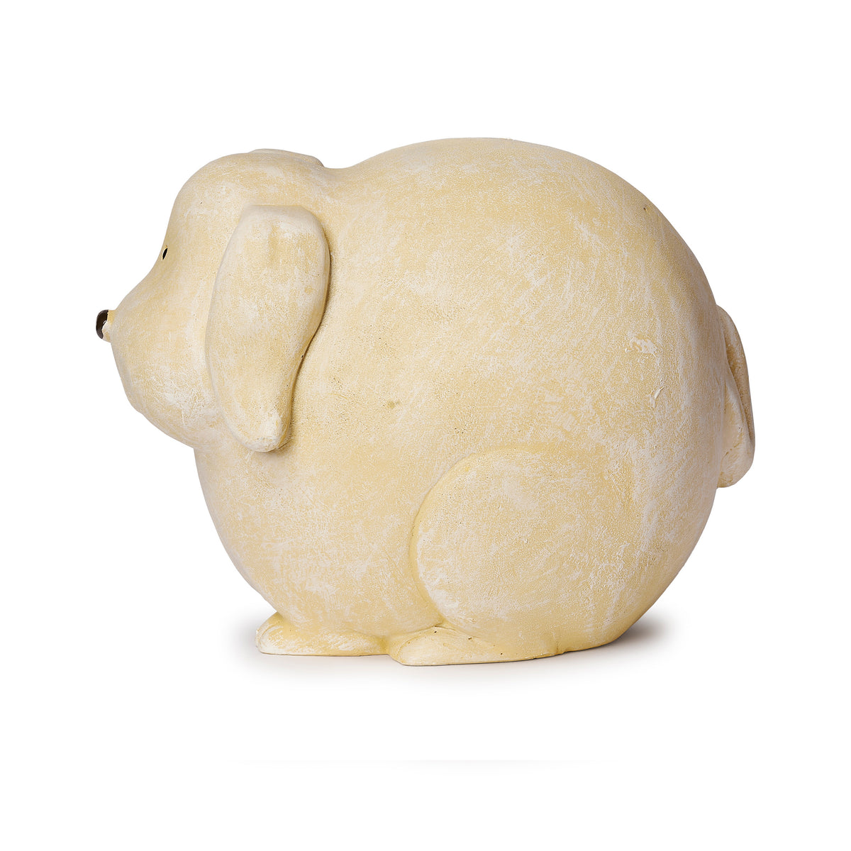 Side view of Pudgy Pals Dog Garden Statue showing the rounded body, sculpted ear, and smooth tan finish