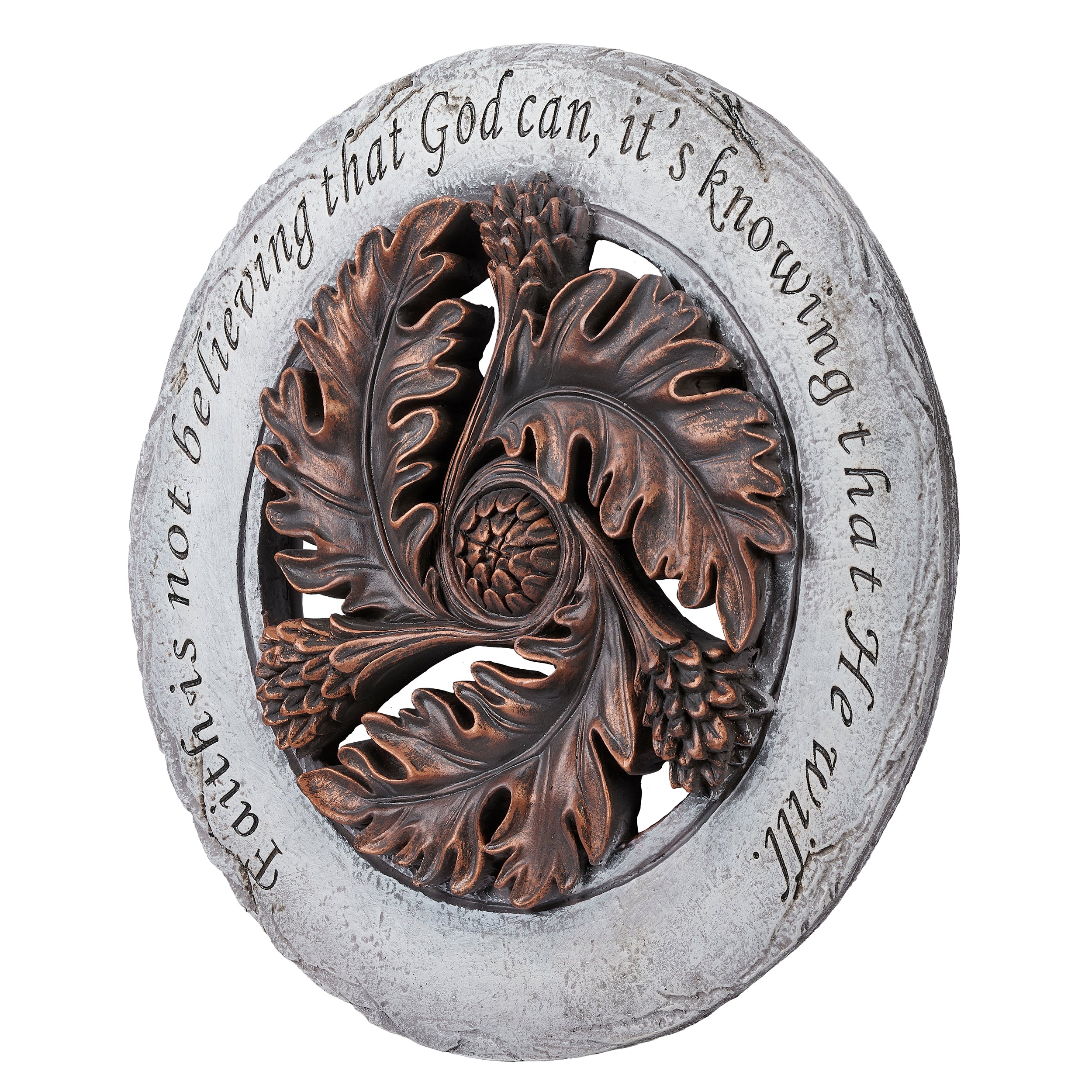 Decorative stone with floral design and engraved text on a white background