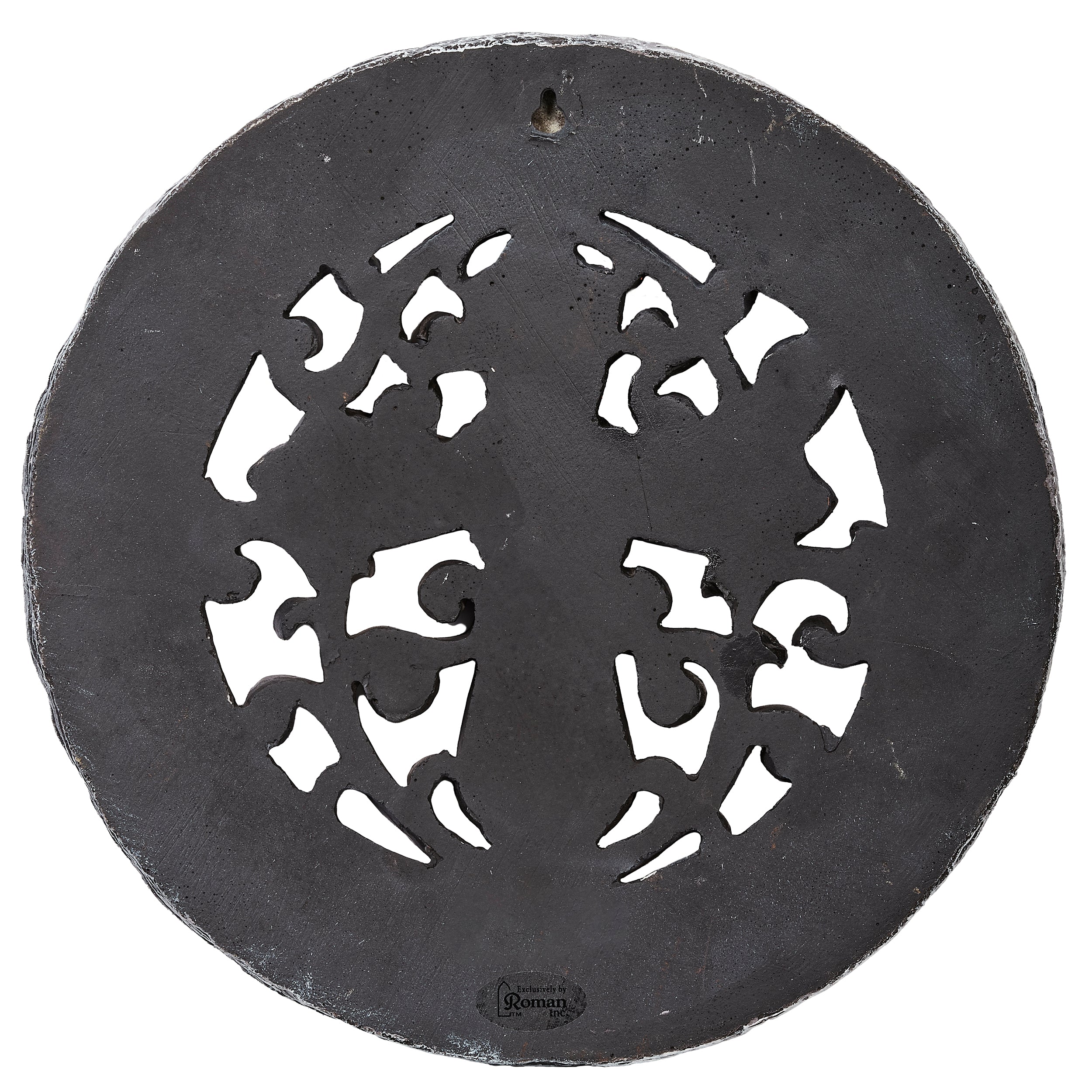 Decorative metal plate with cut-out patterns on a white background