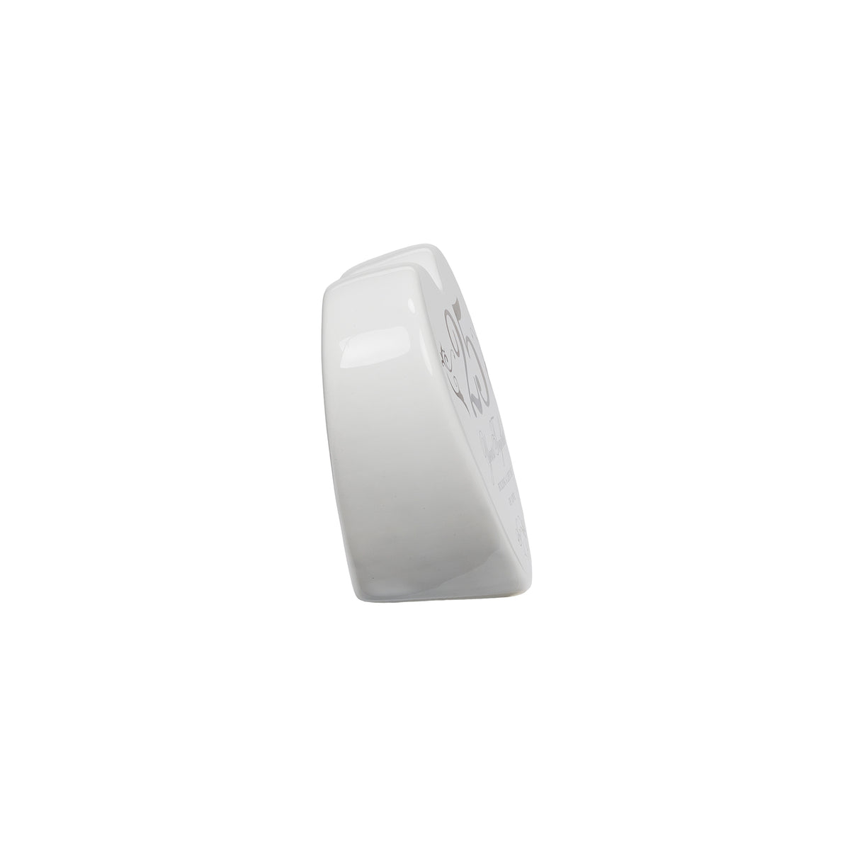 Side view of ceramic heart keepsake showing its thick, freestanding profile.
