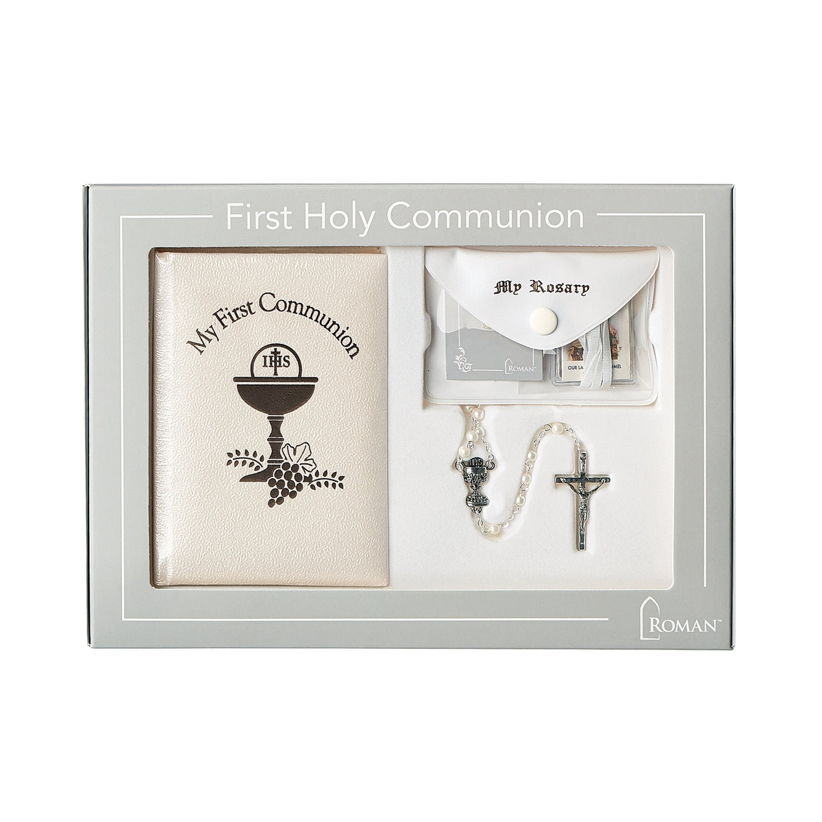 White Deluxe First Communion Book & Accessory Set displayed in the packaging with the prayer book, rosary, cross pin, and devotional accessories arranged inside