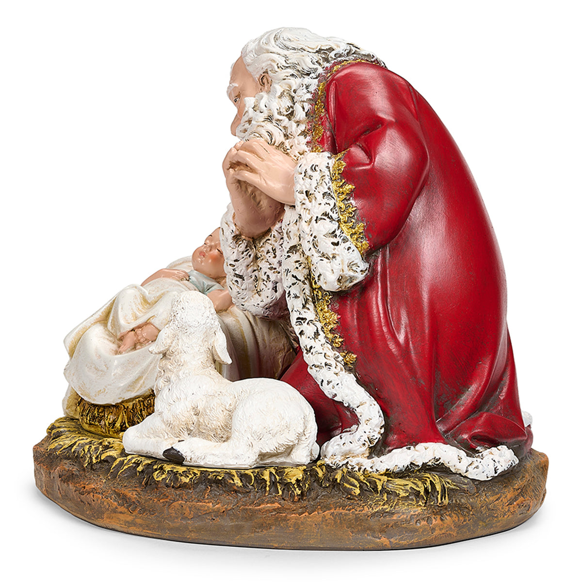 Side view of Joseph's Studio Kneeling Santa Figure showing Santa bowed in prayer beside the sleeping infant Jesus and lamb