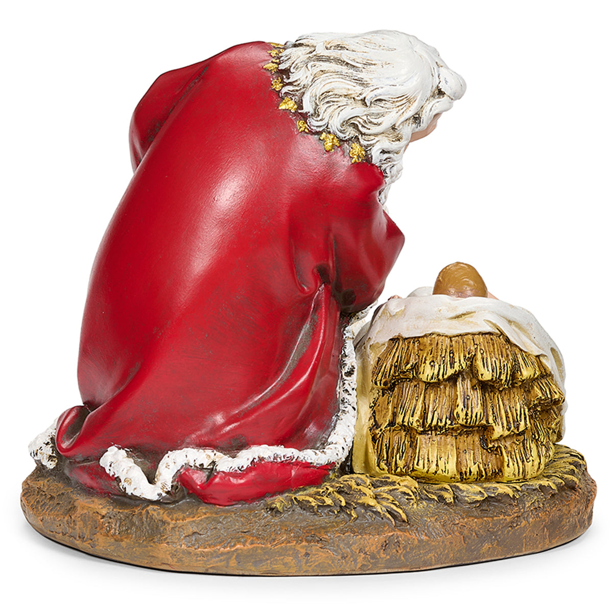 Rear angled view of Joseph's Studio Kneeling Santa Figure showing the red robe, sculpted hay, and Nativity base