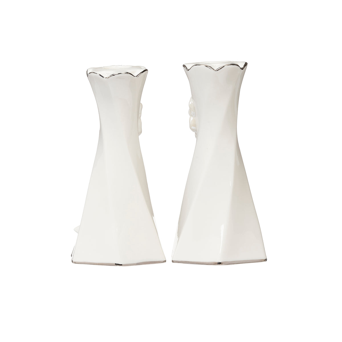Rear view of the two taper candle holders showing their smooth, tapered shapes.