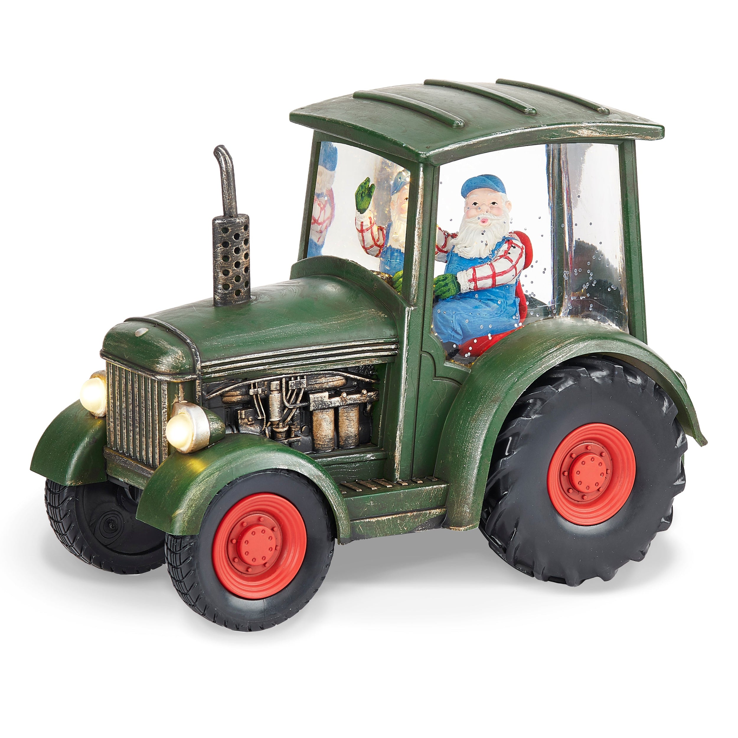 Model of a green tractor with a transparent body showing a Santa Claus figure inside, on a white background.