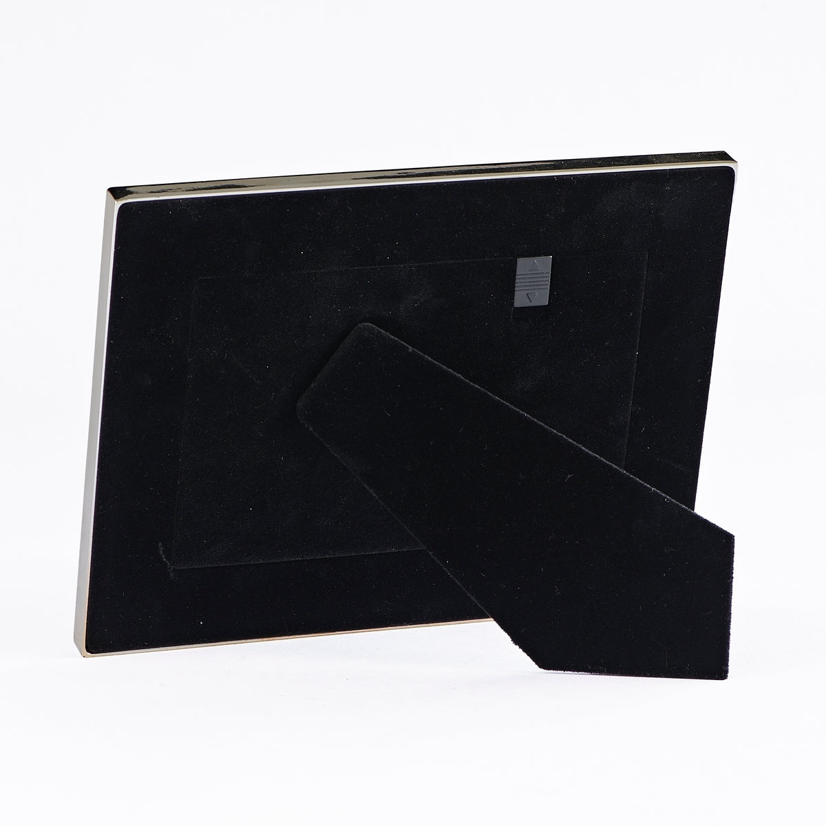 Back view of Caroline Collection Silver Heart Picture Frame showing the black backing and easel stand