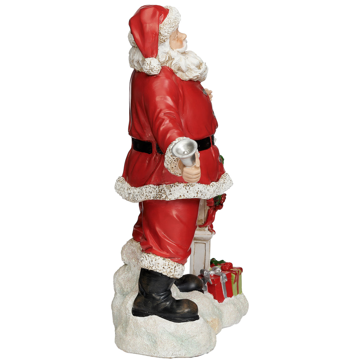 Side view of Joseph's Studio Cheerful Festive Santa Figure showing Santa beside the holiday sign and stacked wrapped gifts
