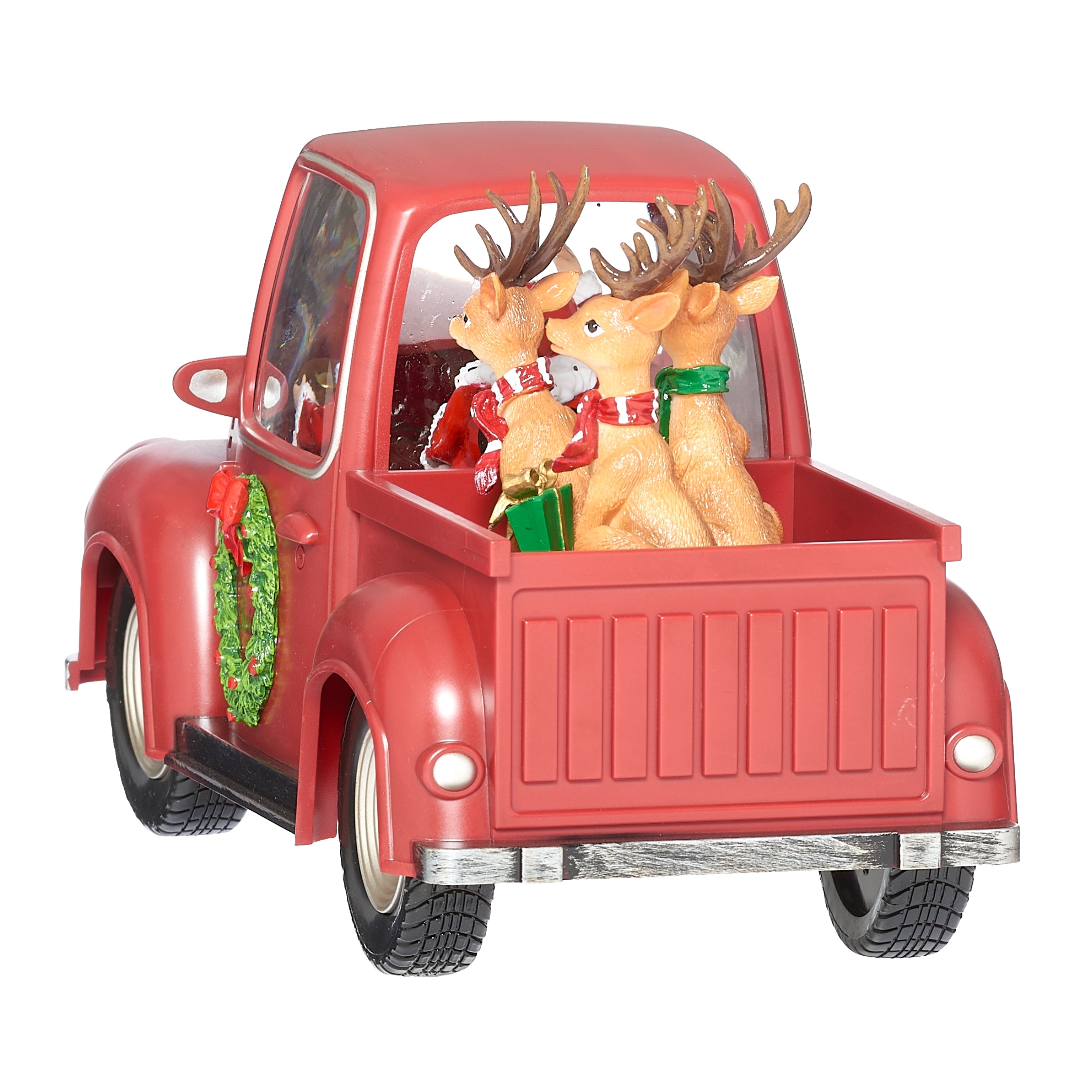 Red Christmas truck with Santa Claus figure and reindeer on a white background