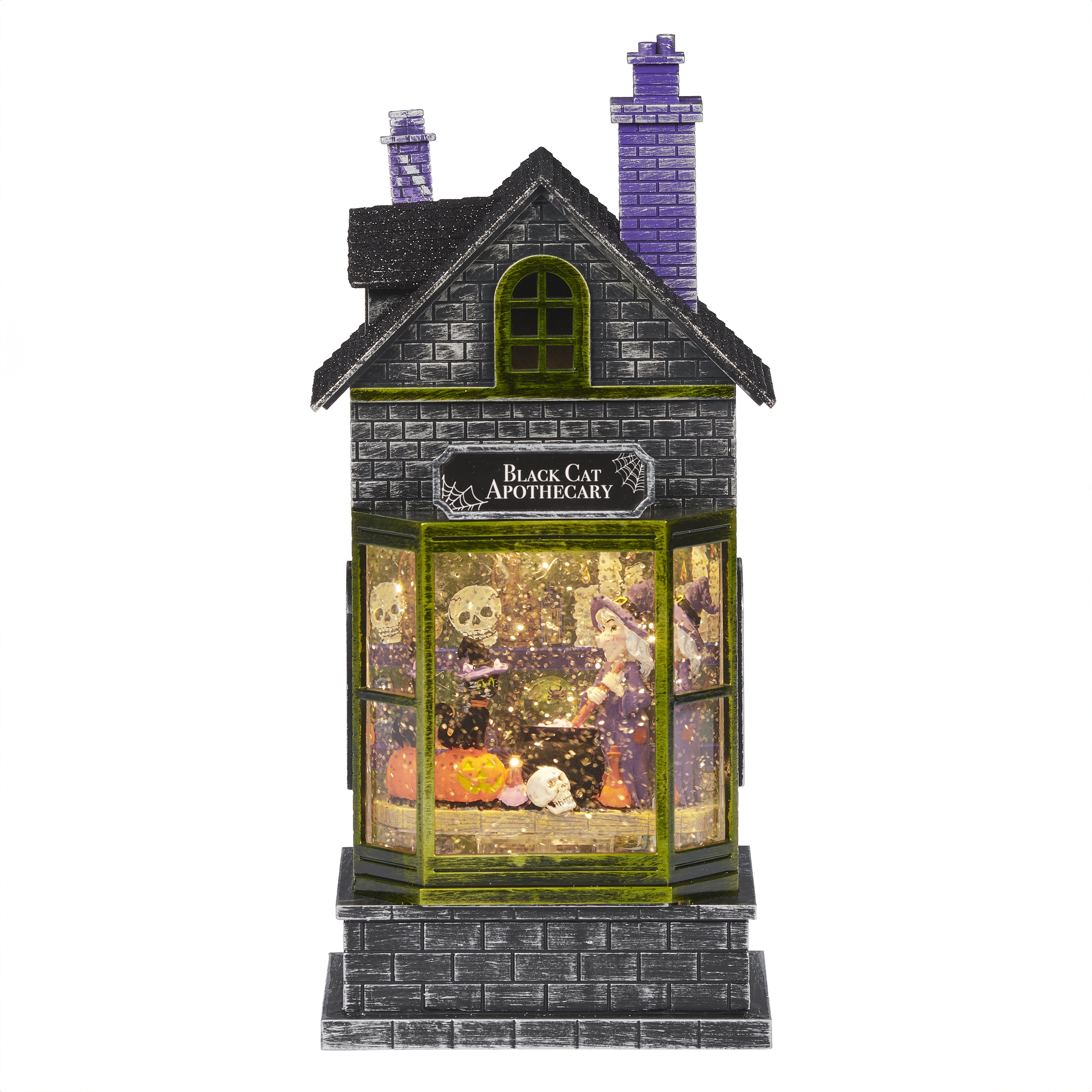 Decorative Halloween-themed house with  a witch inside and 'Black Cat Apothecary' sign