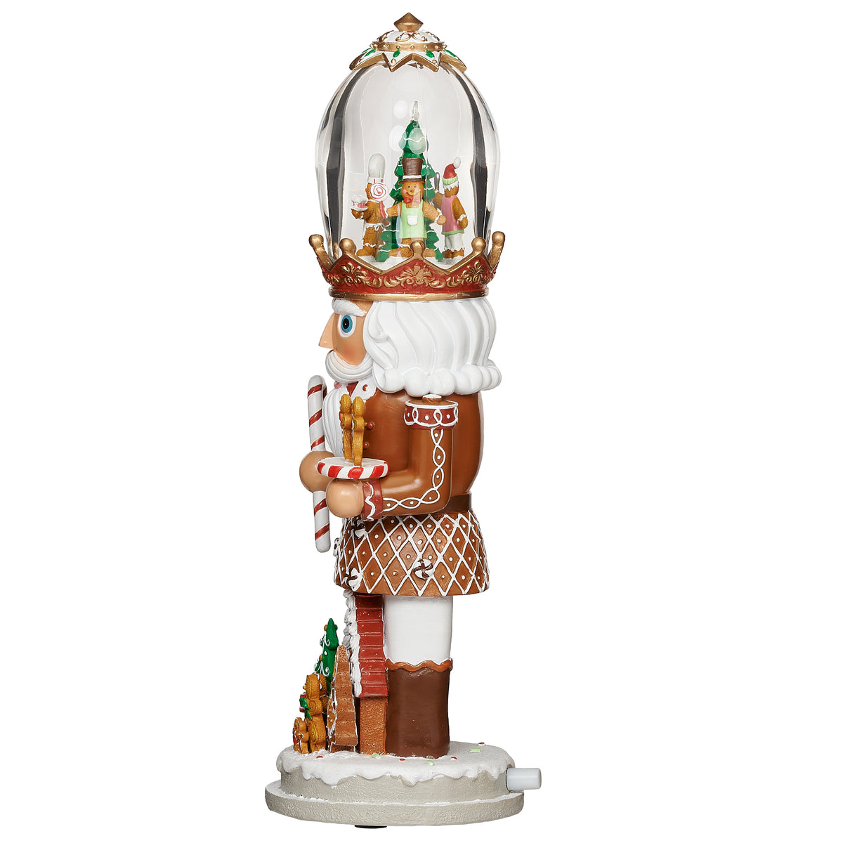 Side view of Gingerbread Nutcracker Lighted Musical showing the tall clear dome, candy-themed uniform, and sculpted details