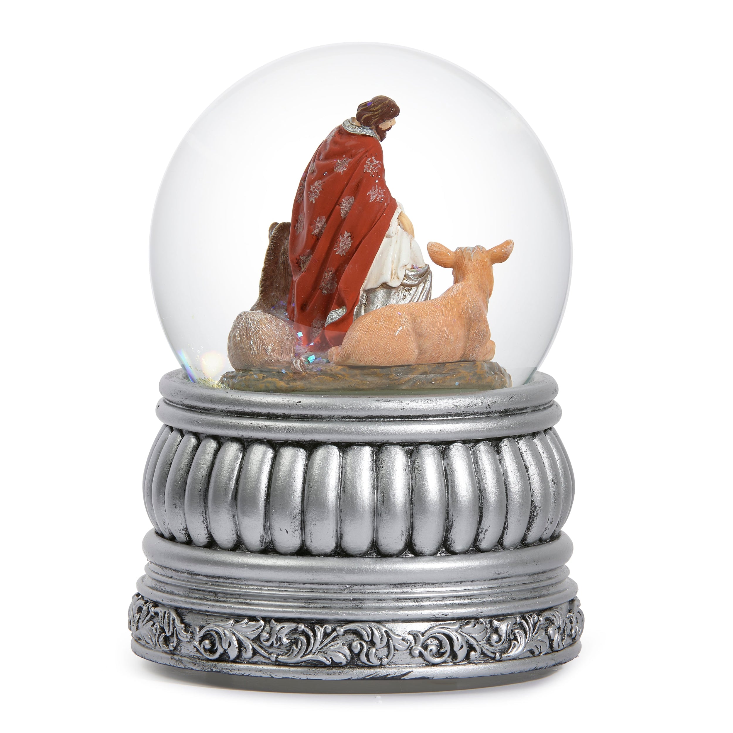 Snow globe with a Nativity scene a white background