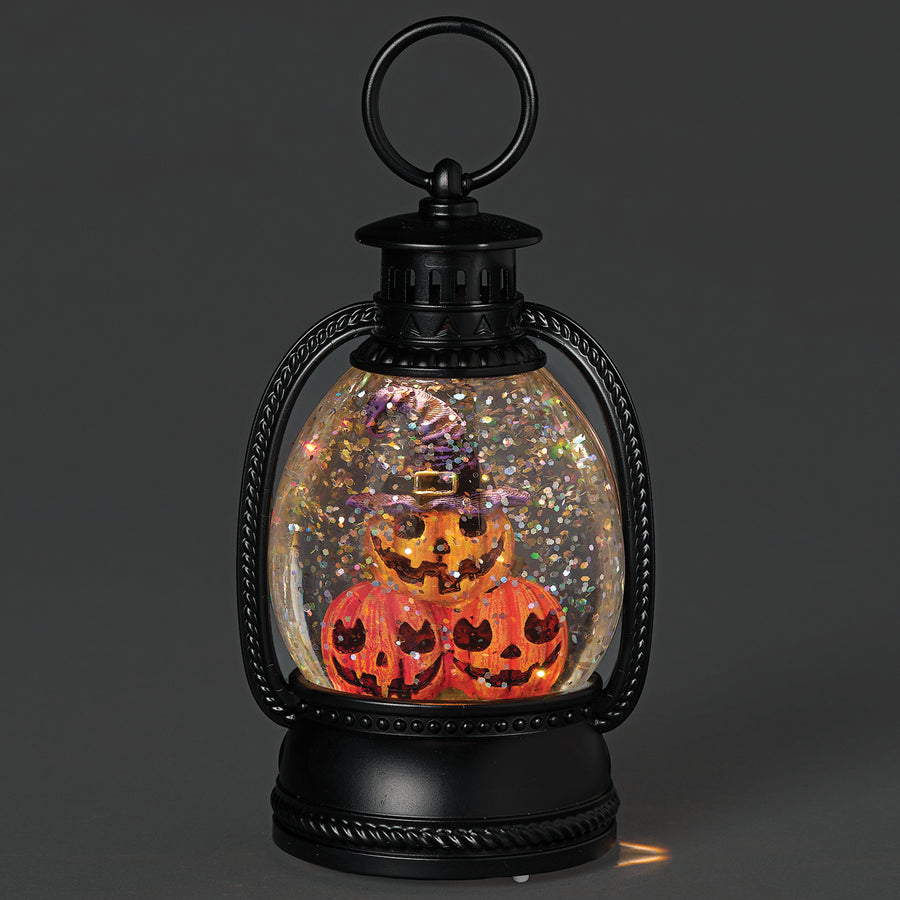 Halloween-themed lantern with jack-o'-lanterns inside