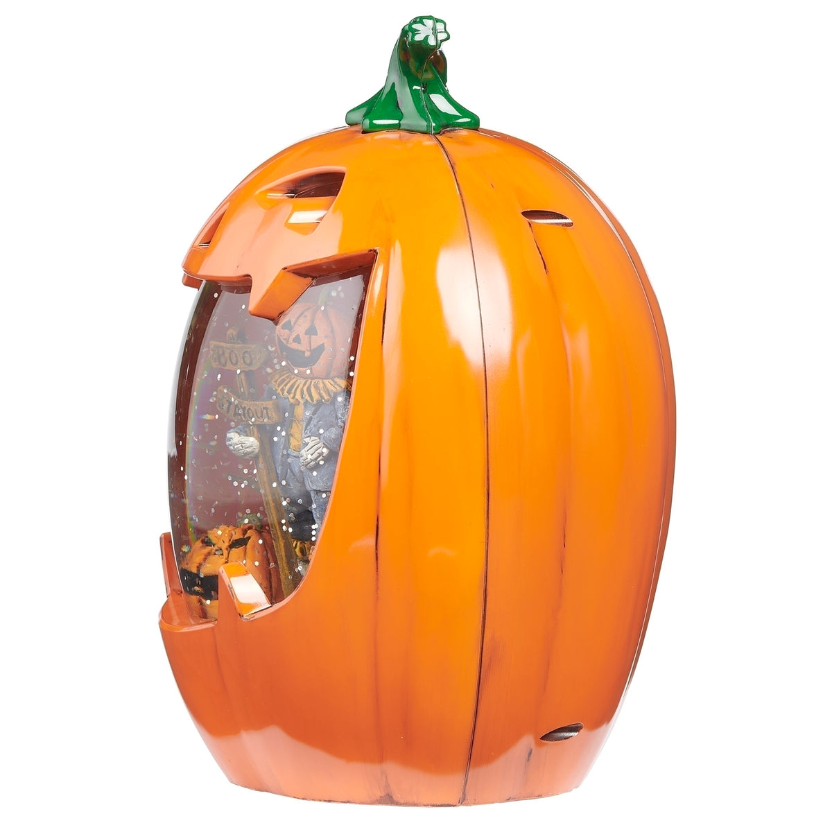 Angled view of scarecrow jack-o’-lantern decoration showing its clear front window, ribbed orange sides, and curved green stem.