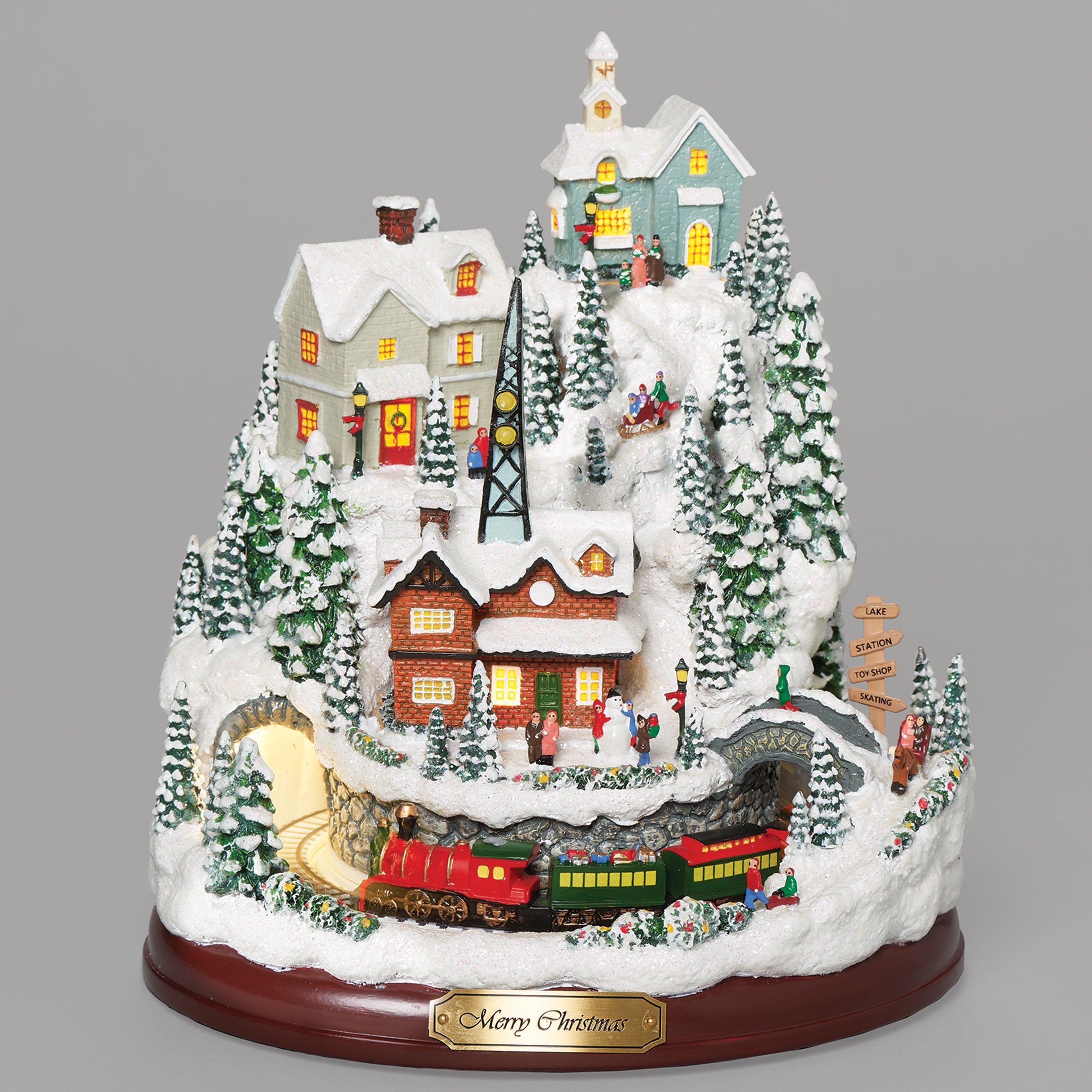 Amusements Lighted Musical Snowy Mountain Village with Rotating Train