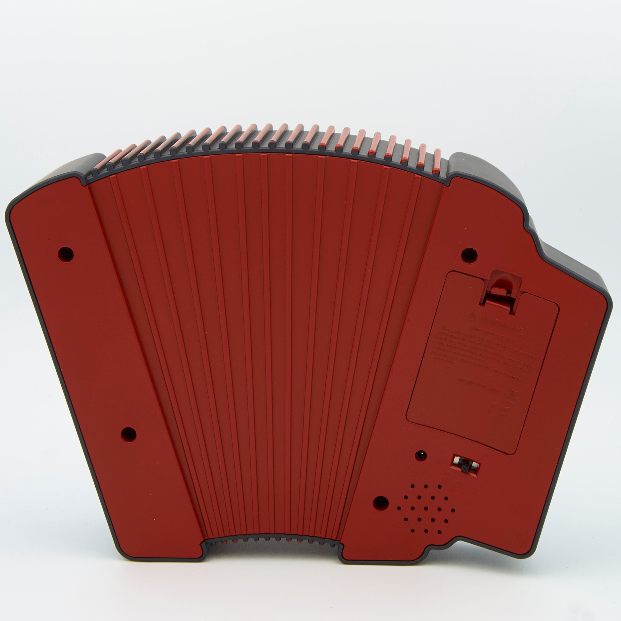 Red accordion on a white background
