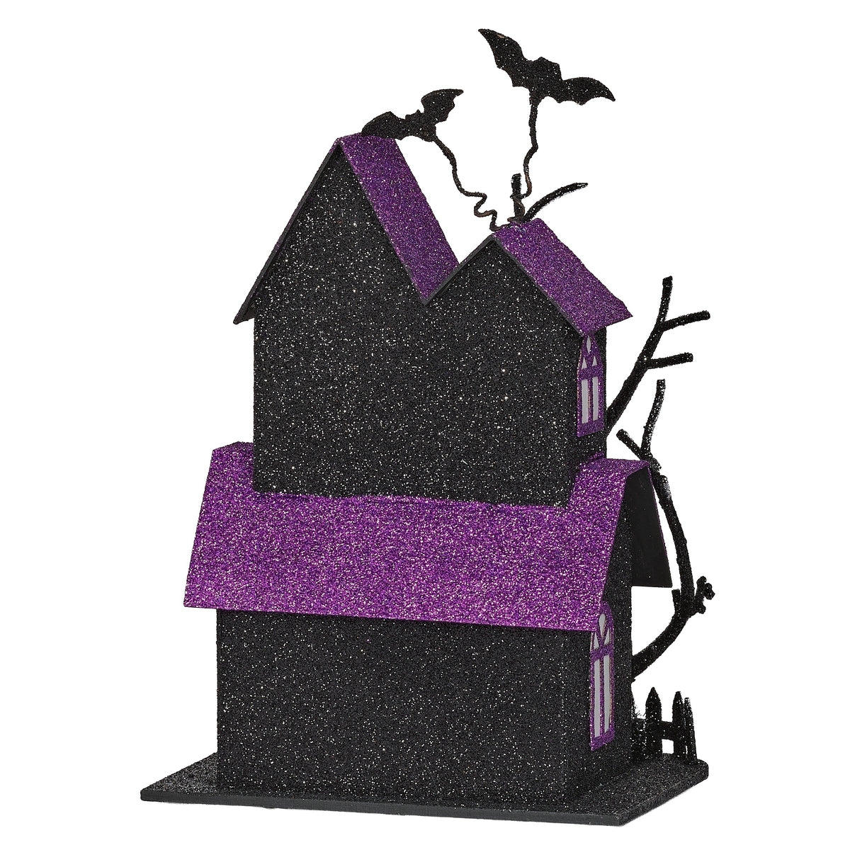 Rear view of haunted house showing black walls, purple glitter roof sections, and bats above the roofline.