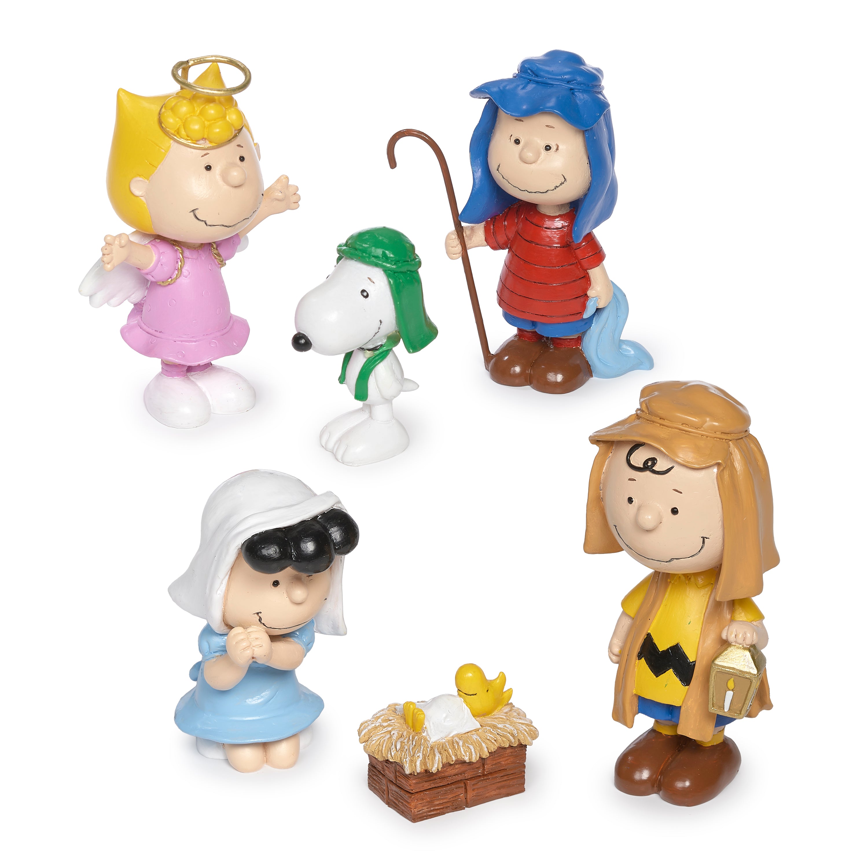 The peanuts characters dressed in a nativity set