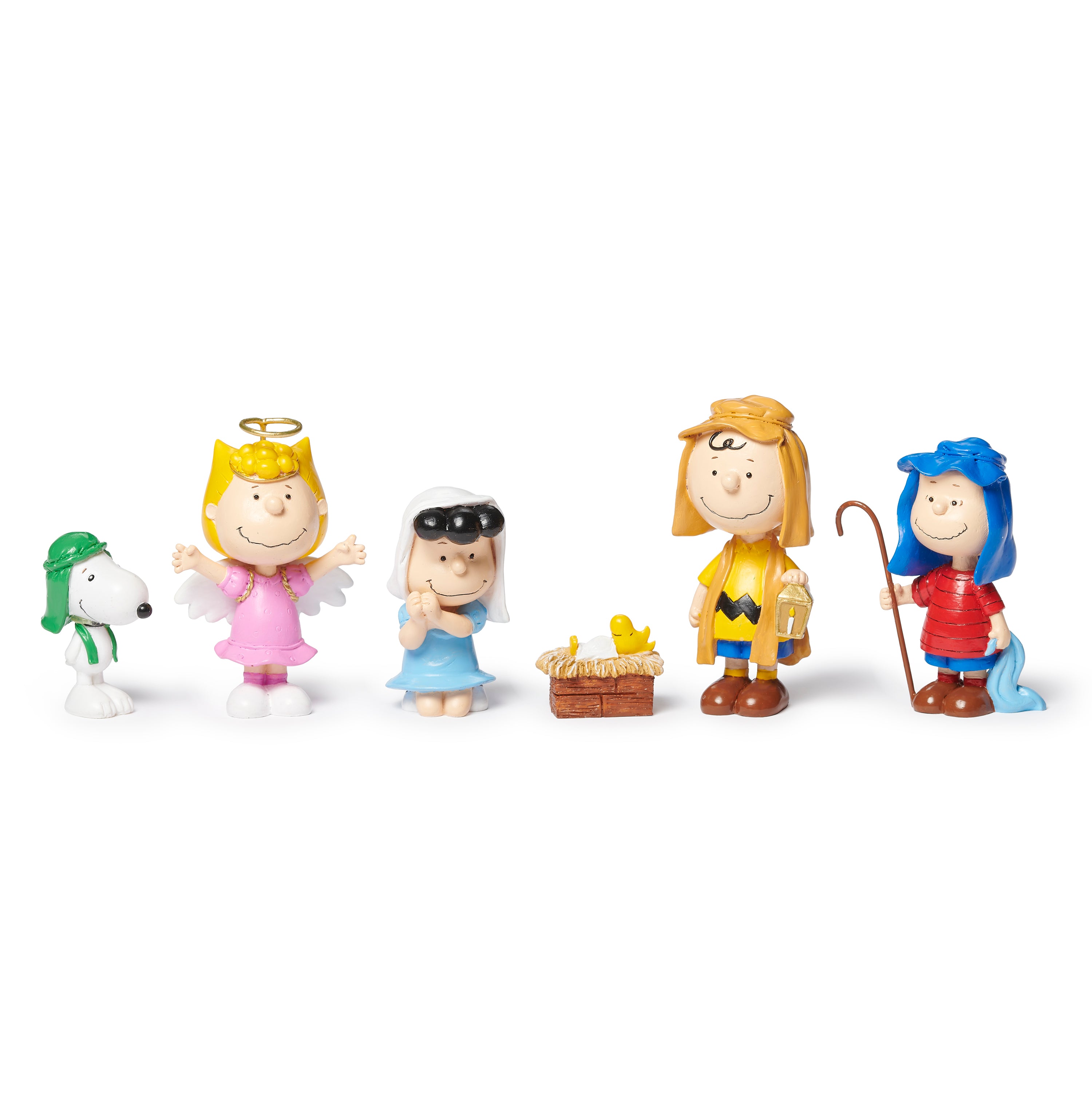The peanuts characters dressed in a nativity set