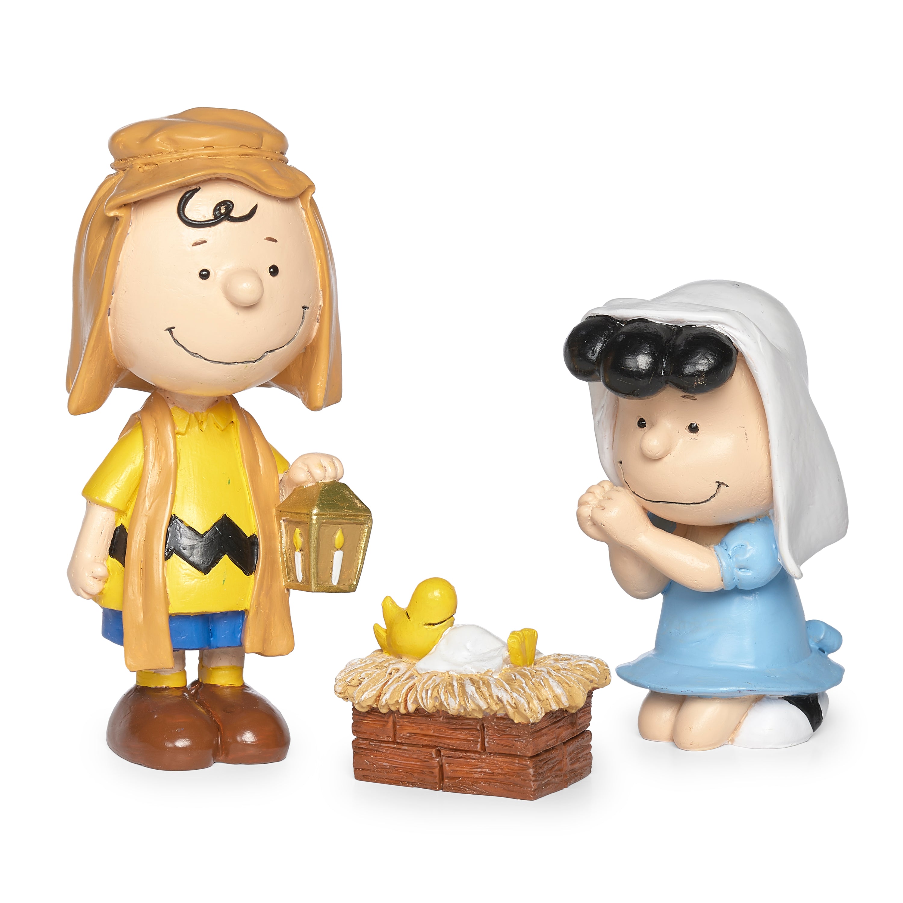The peanuts characters dressed in a nativity set